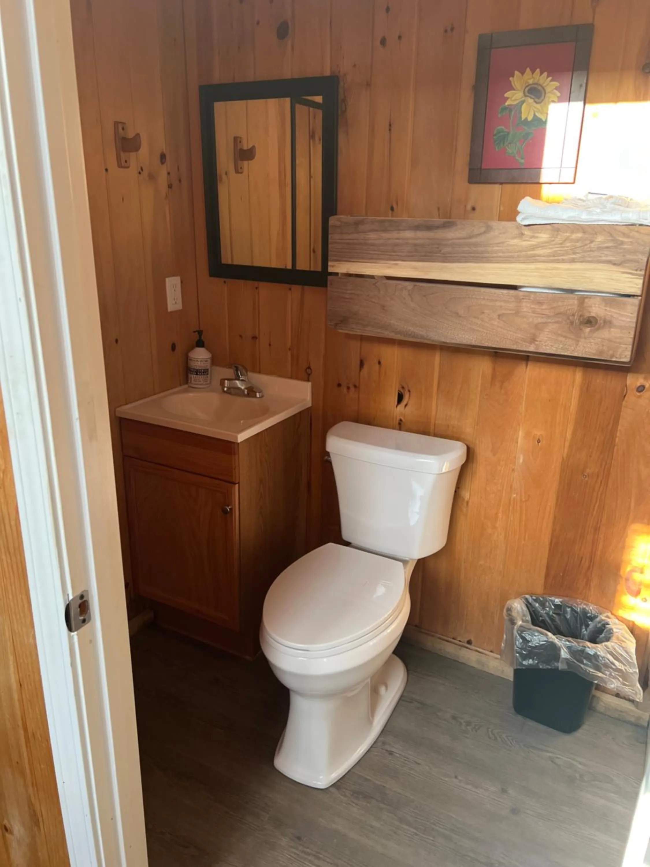 Toilet in Kozy Haven Log Cabin Rentals