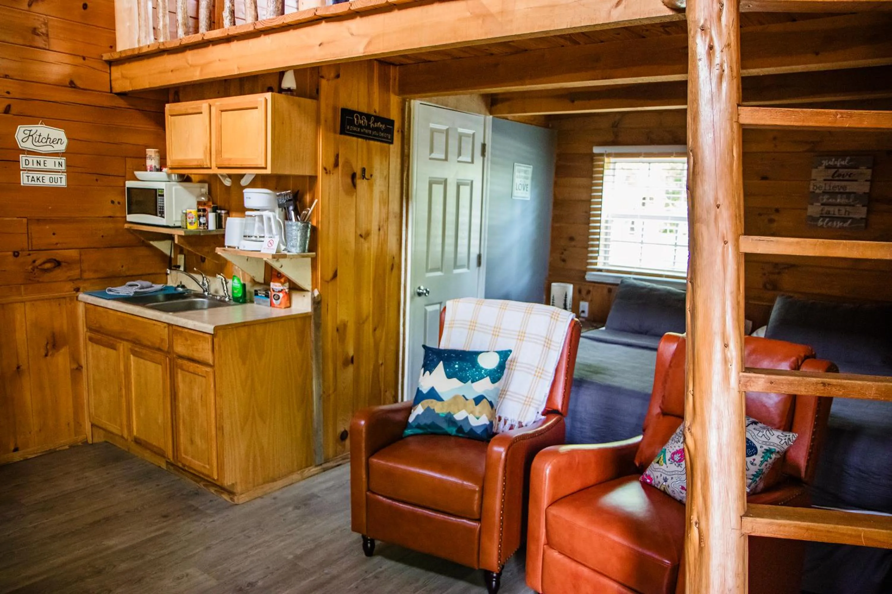 Bed in Kozy Haven Log Cabin Rentals