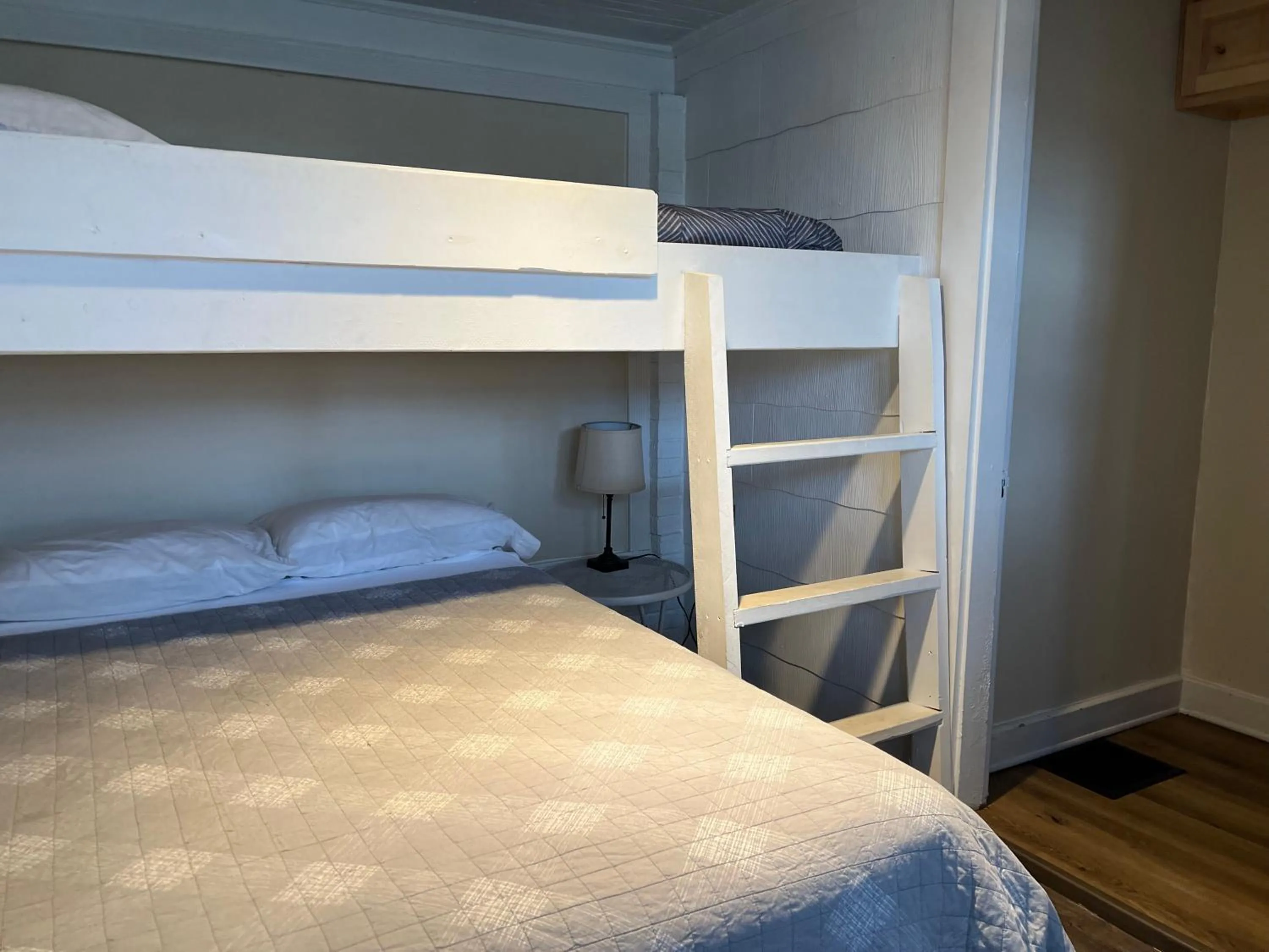 Bed in Kozy Haven Log Cabin Rentals