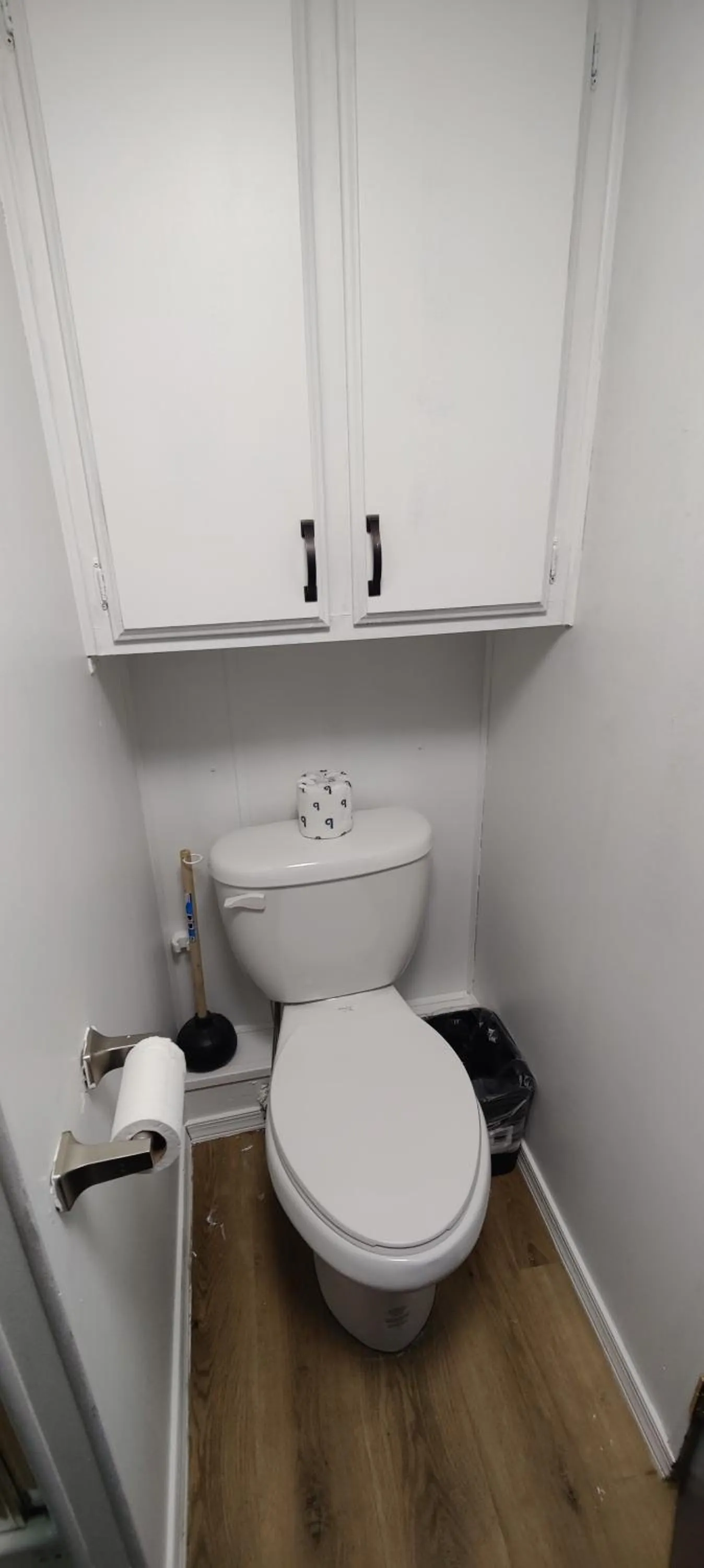 Toilet in Kozy Haven Log Cabin Rentals