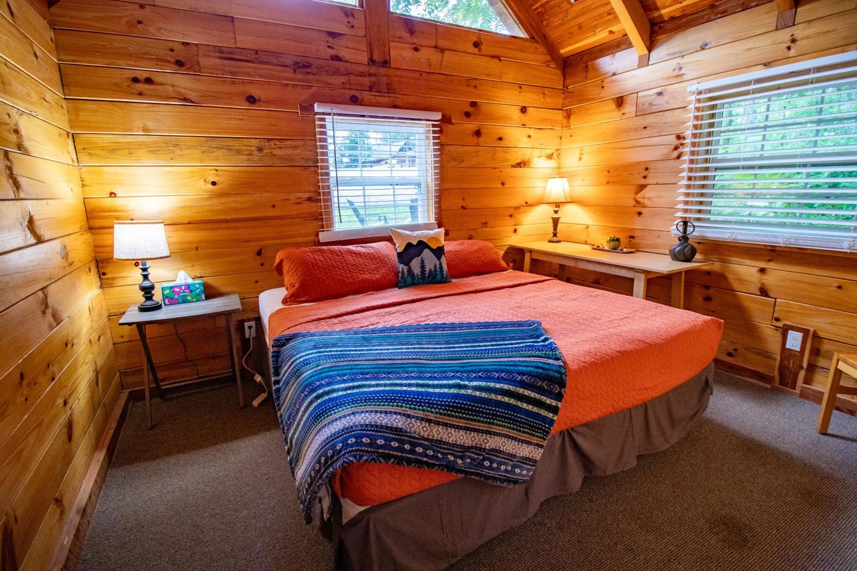 Bed in Kozy Haven Log Cabin Rentals