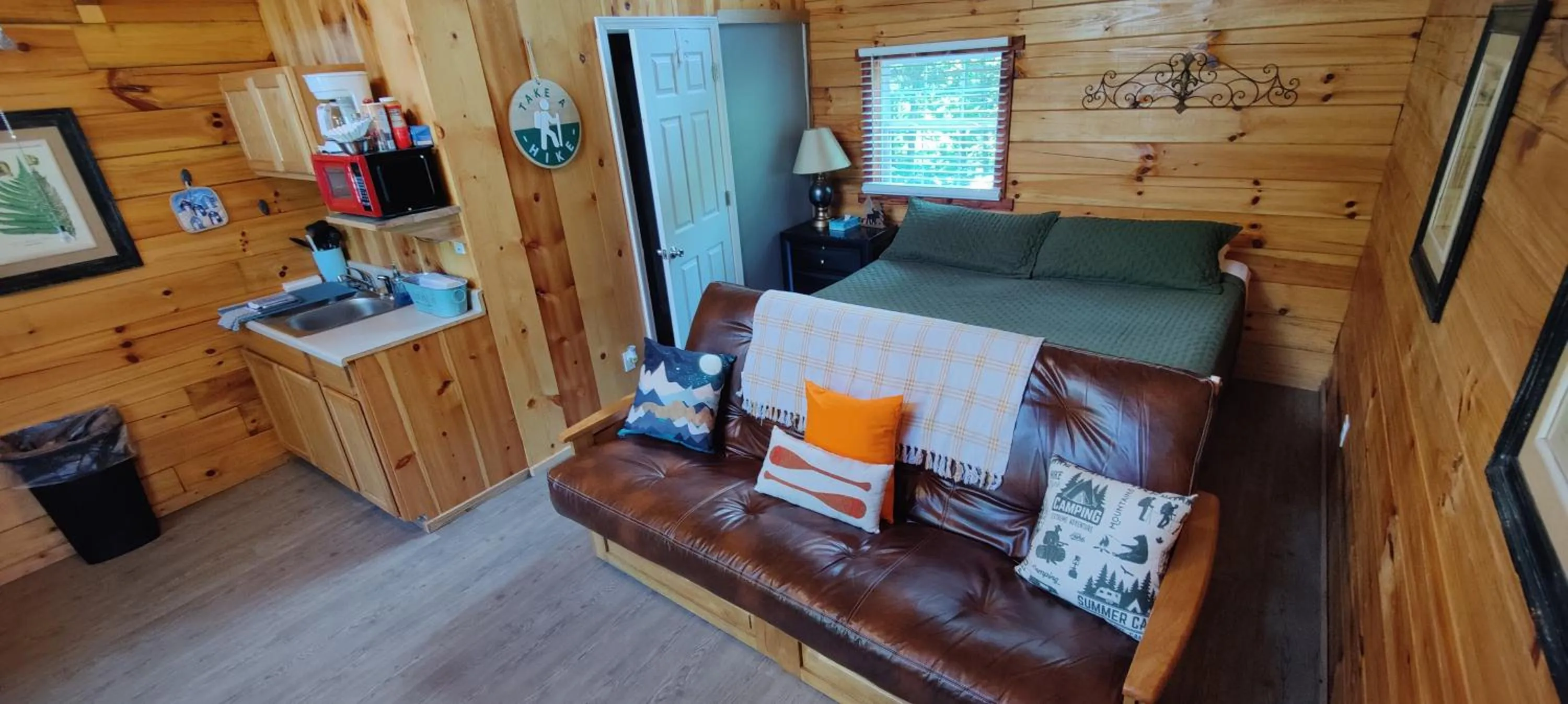 Bed in Kozy Haven Log Cabin Rentals