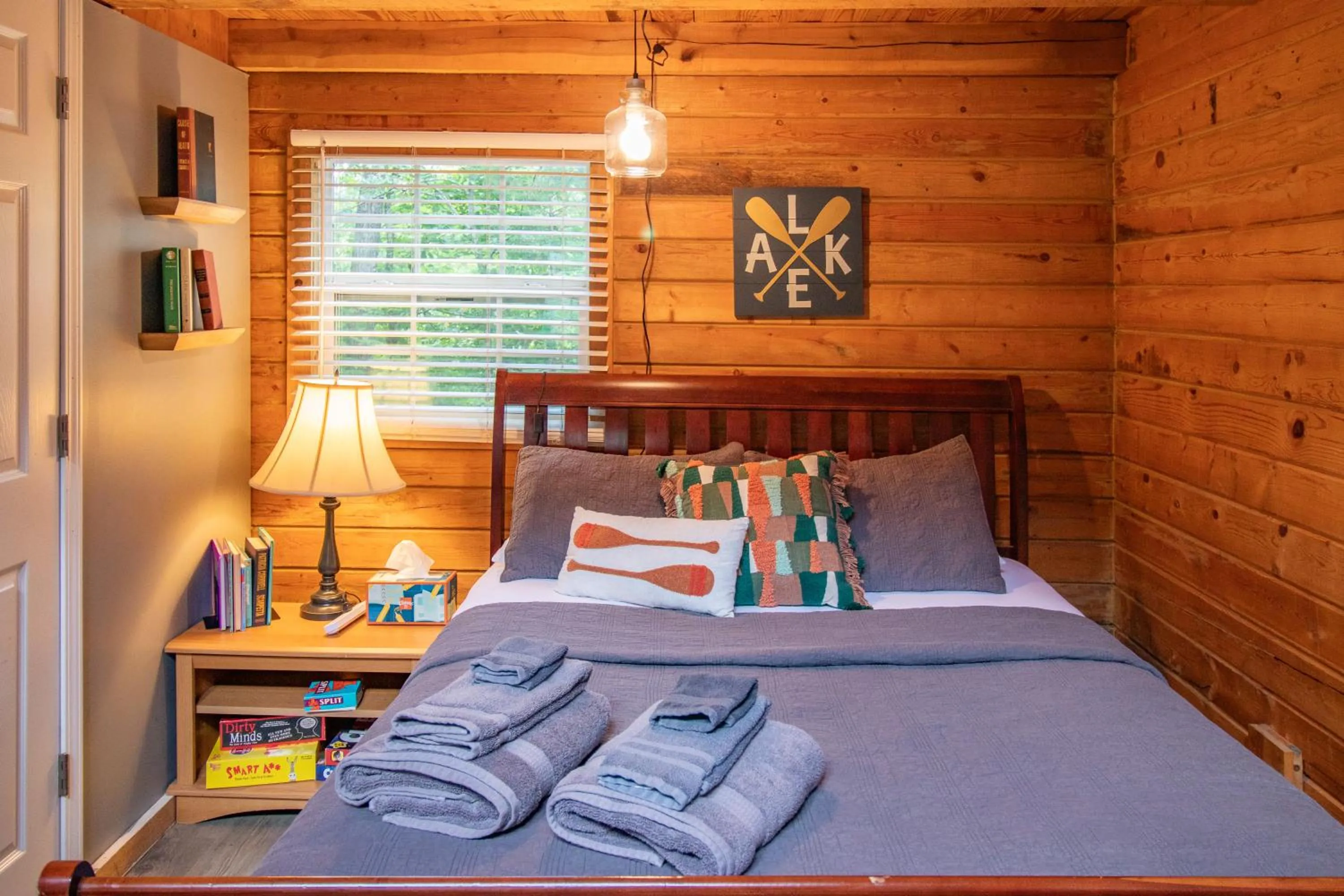Bed in Kozy Haven Log Cabin Rentals