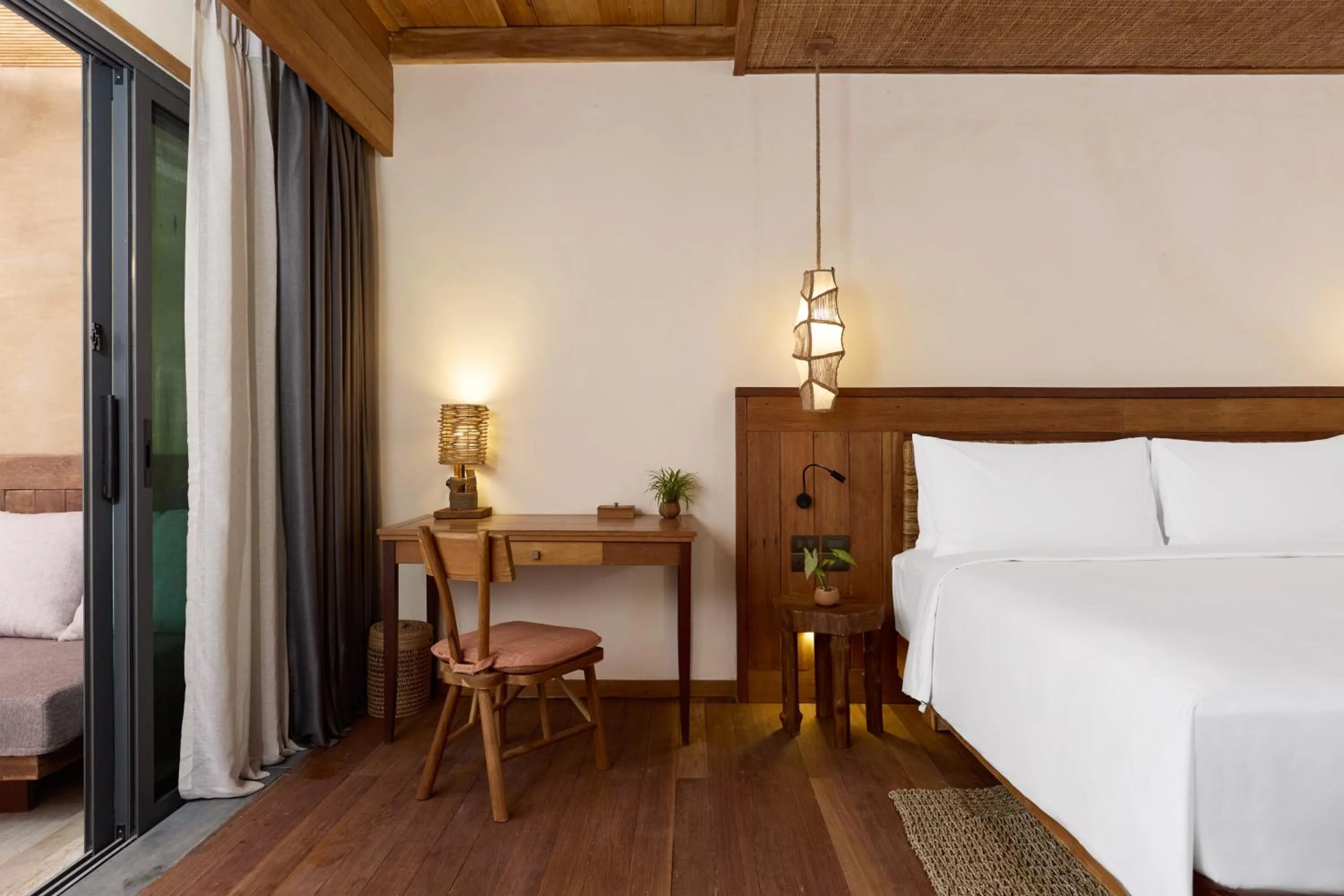 Bed in Vignette Collection Dinso Resort & Villas Ko Chang by IHG