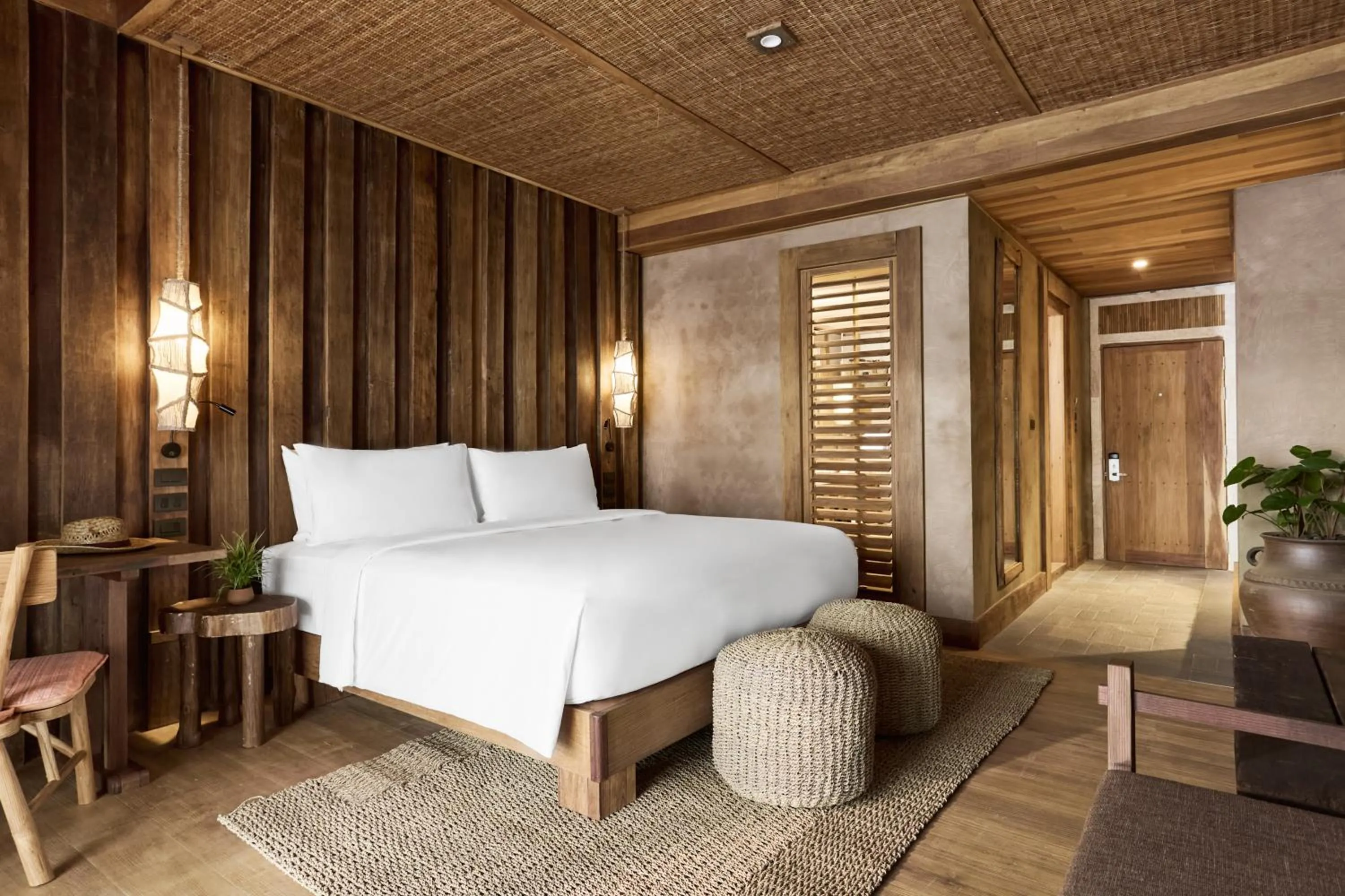 Bed in Vignette Collection Dinso Resort & Villas Ko Chang by IHG