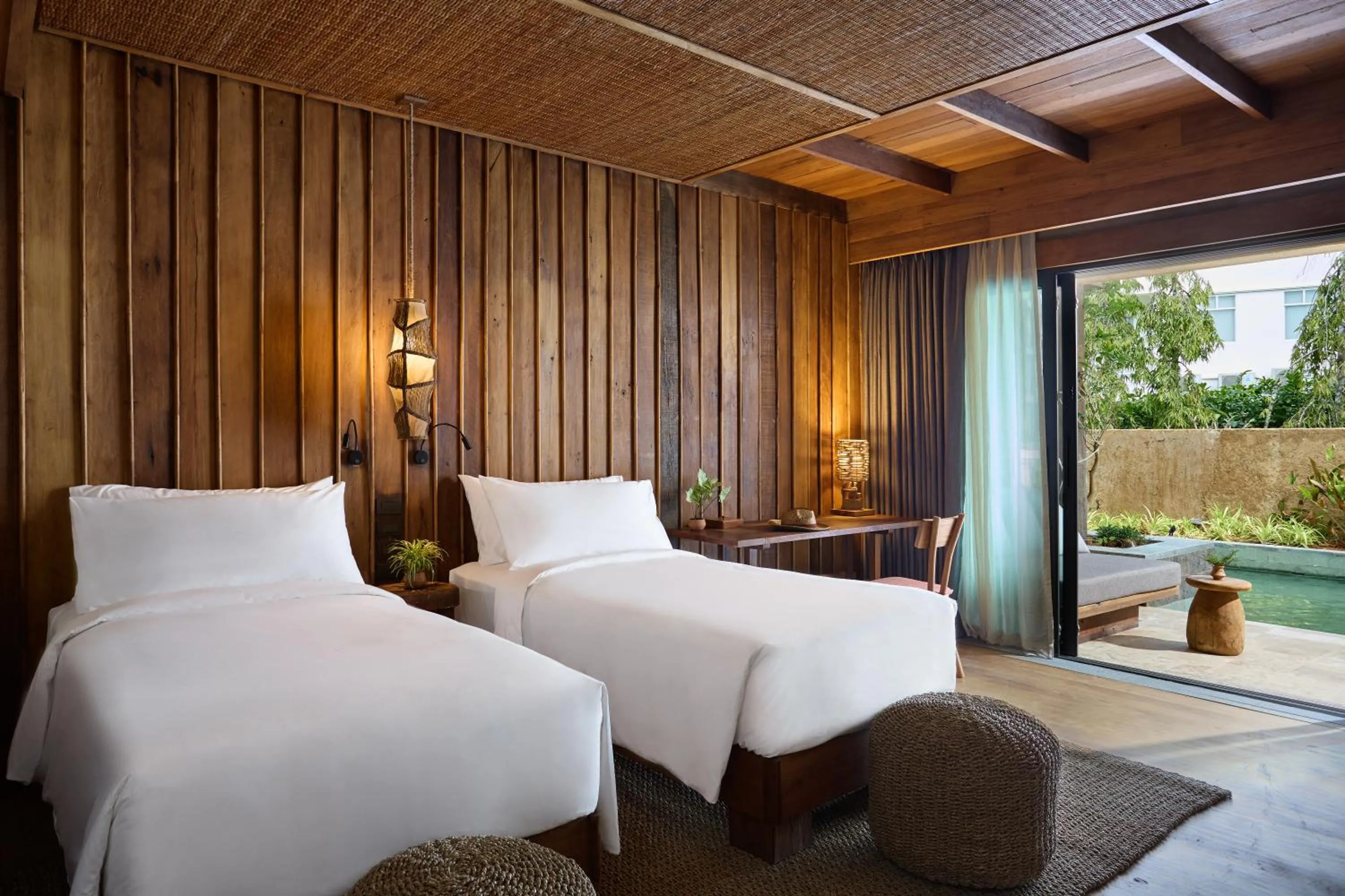 Bed in Vignette Collection Dinso Resort & Villas Ko Chang by IHG