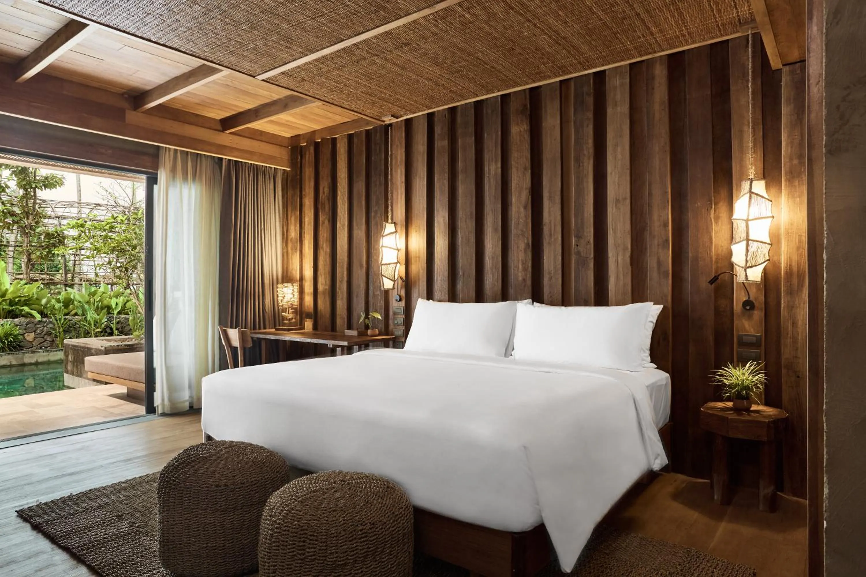 Bed in Vignette Collection Dinso Resort & Villas Ko Chang by IHG