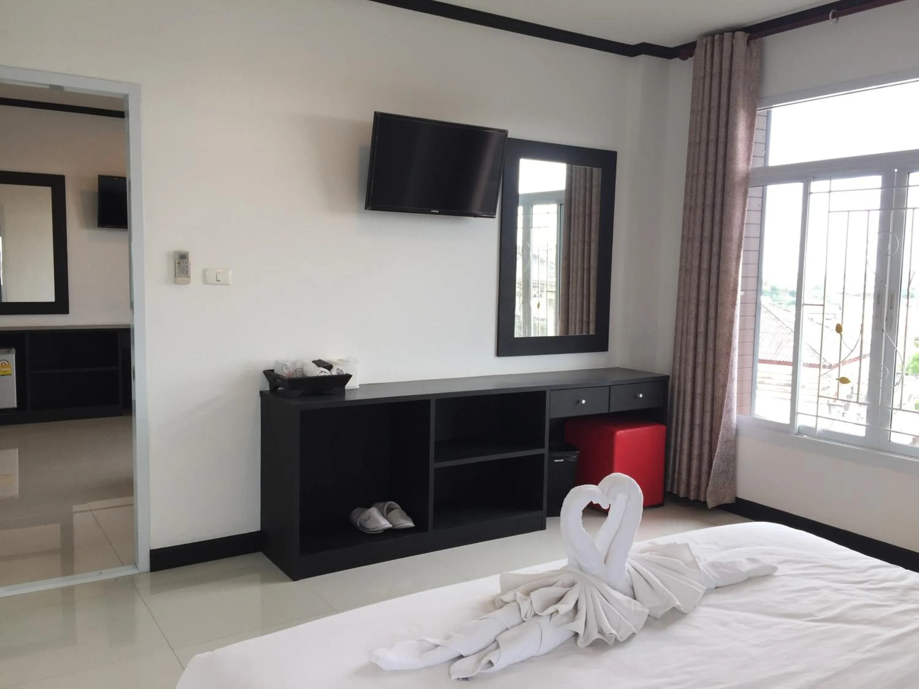 Bed in Leelawadee Grand Hotel