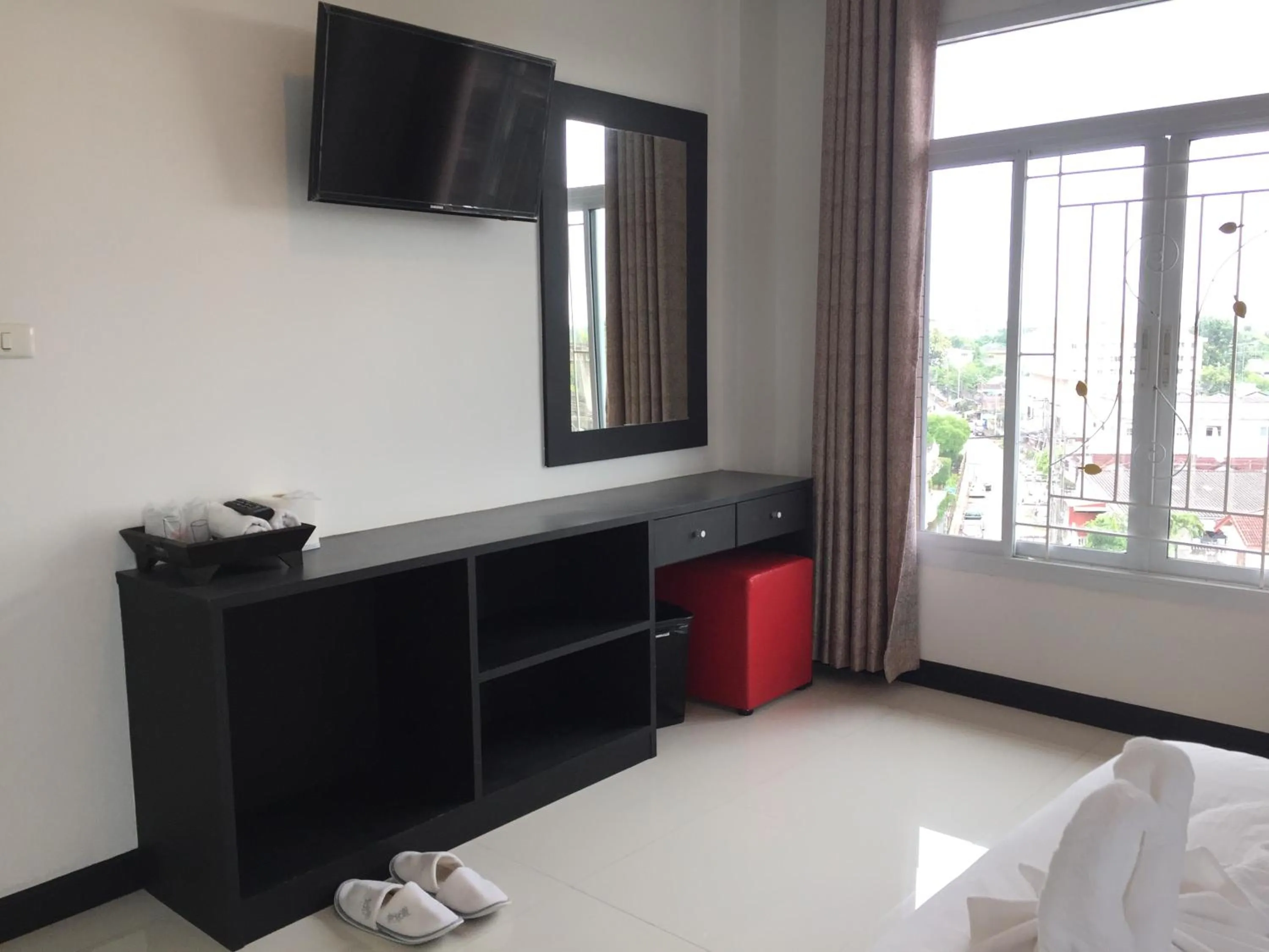 Bed in Leelawadee Grand Hotel