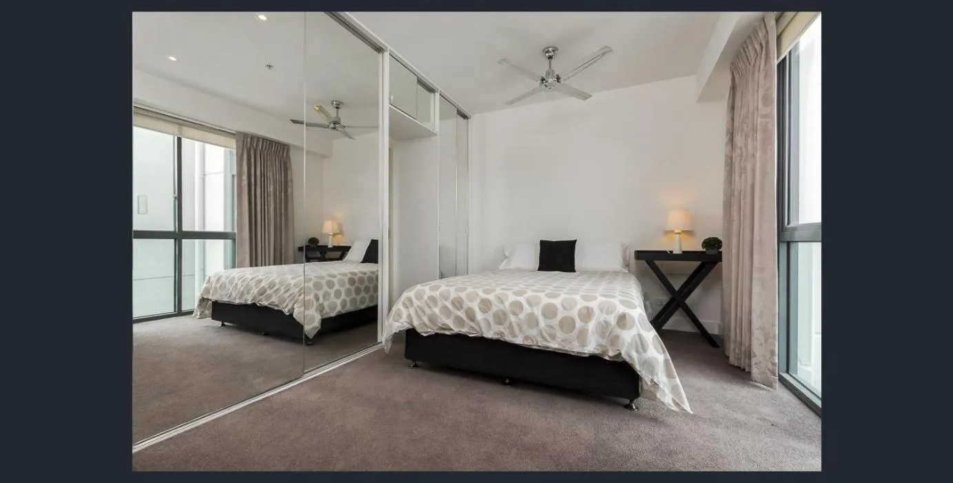 Bed in Waterfront (Yarra St) by Gold Star Stays
