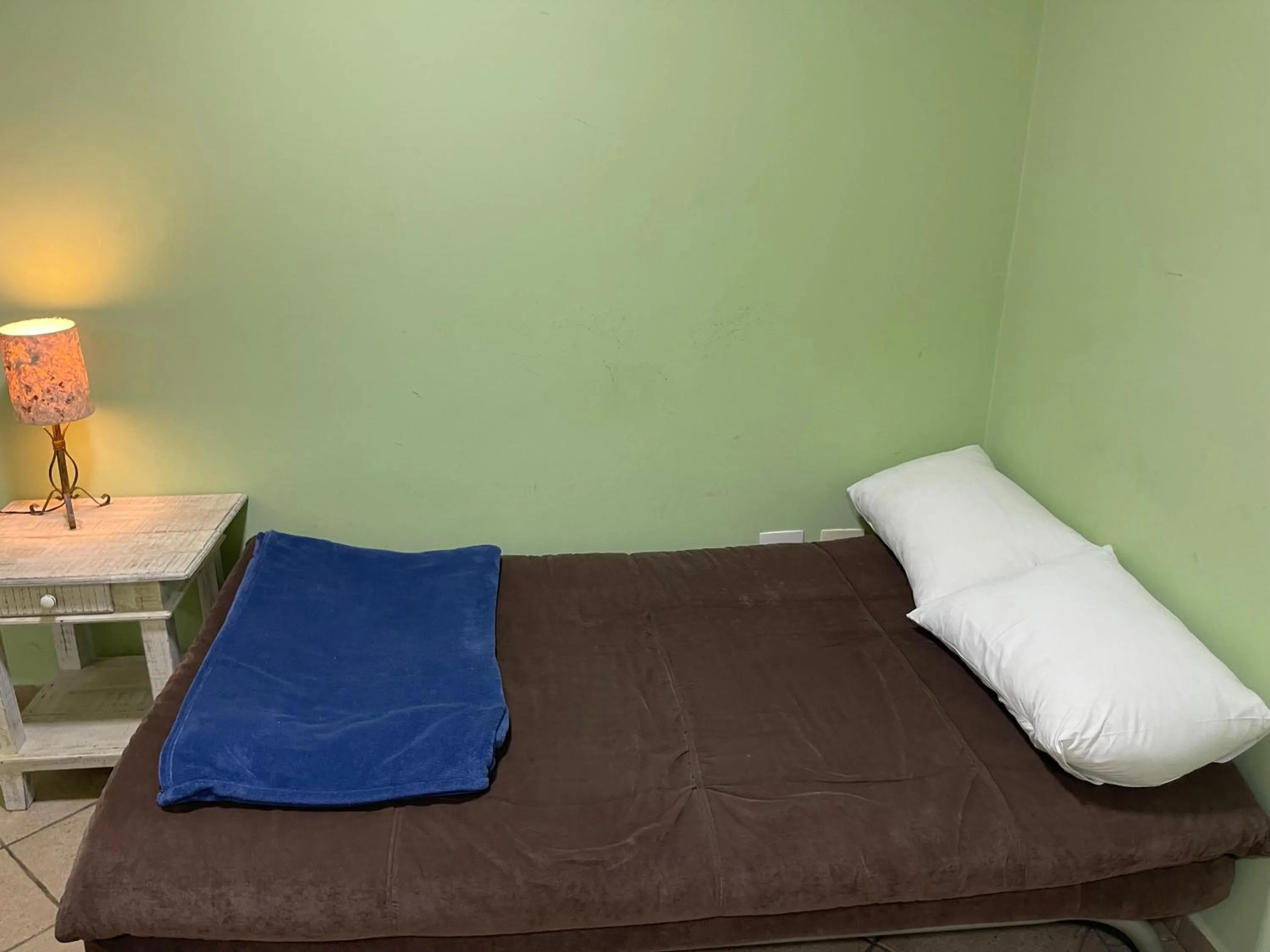 Bed in Surfside Suites