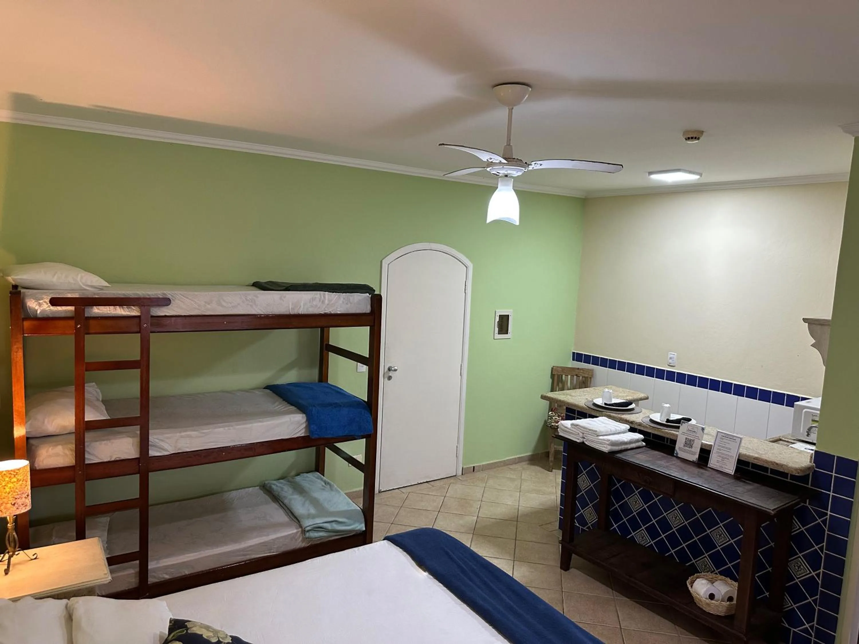 Photo of the whole room, Bed in Surfside Suites