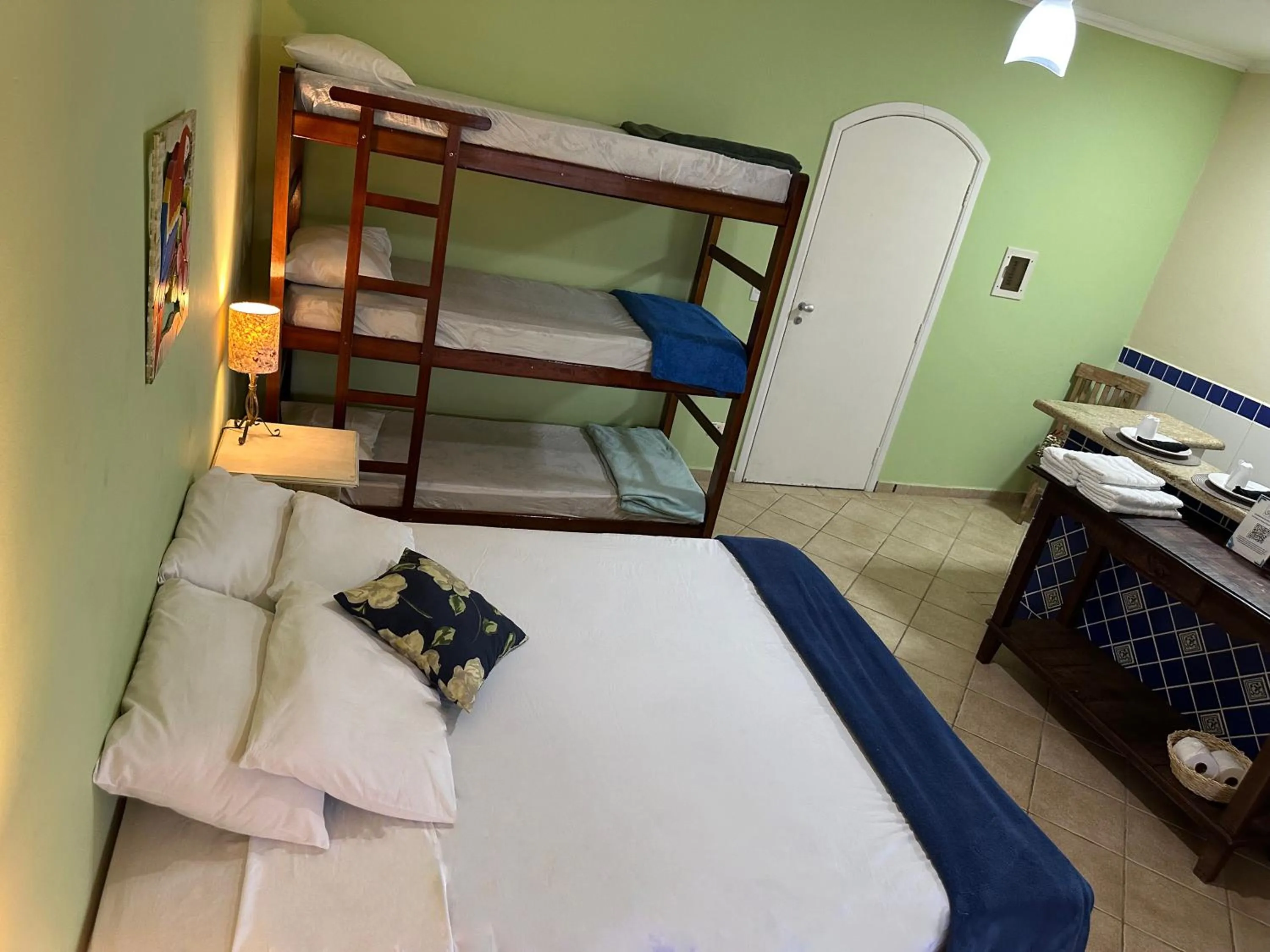 Photo of the whole room, Bed in Surfside Suites