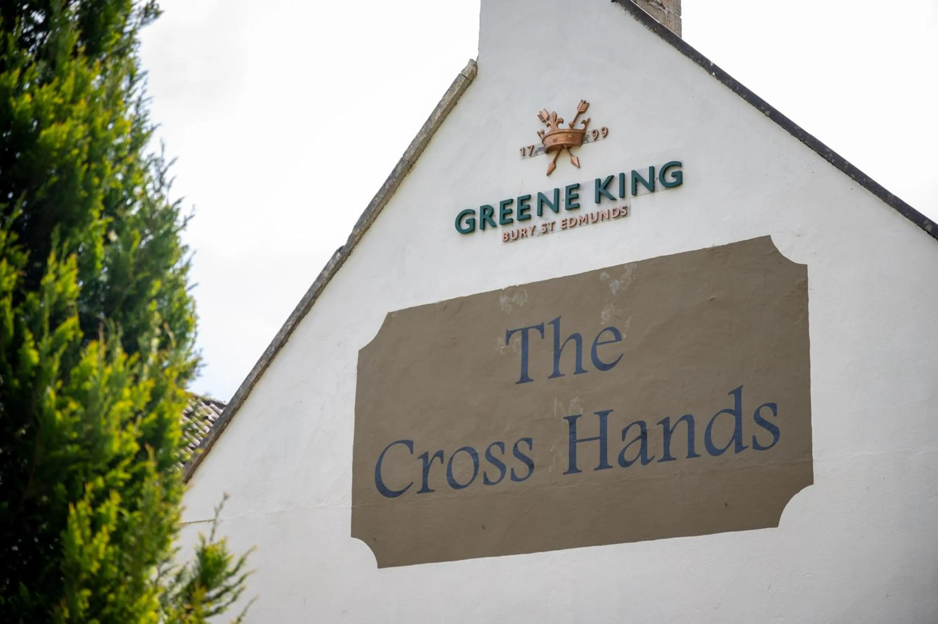 Logo/Certificate/Sign in Cross Hands Hotel by Greene King Inns