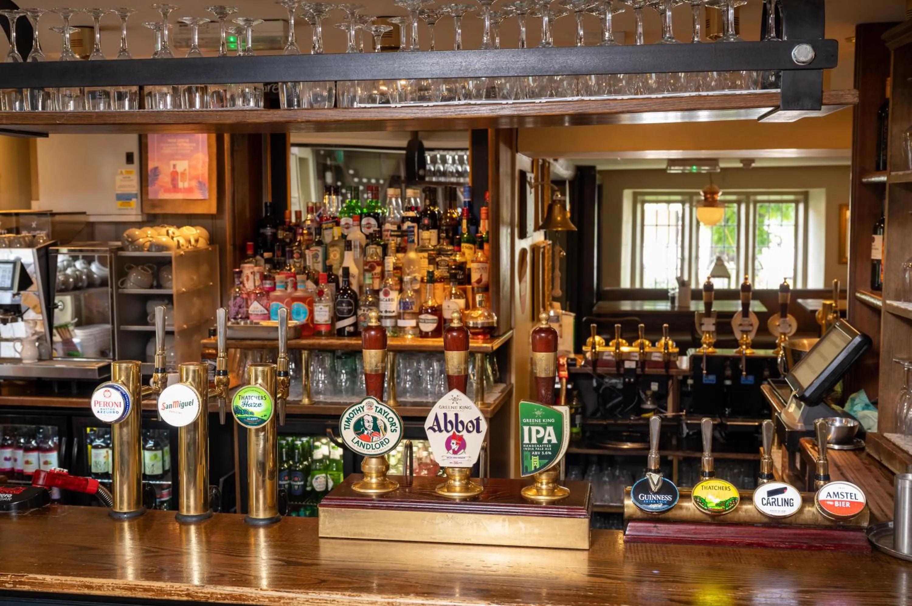 Lounge or bar in Cross Hands Hotel by Greene King Inns