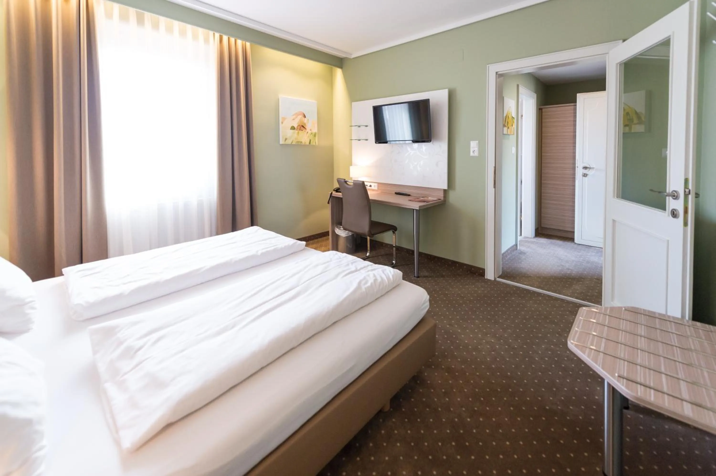 Bedroom, Bed in Hotel Raffel