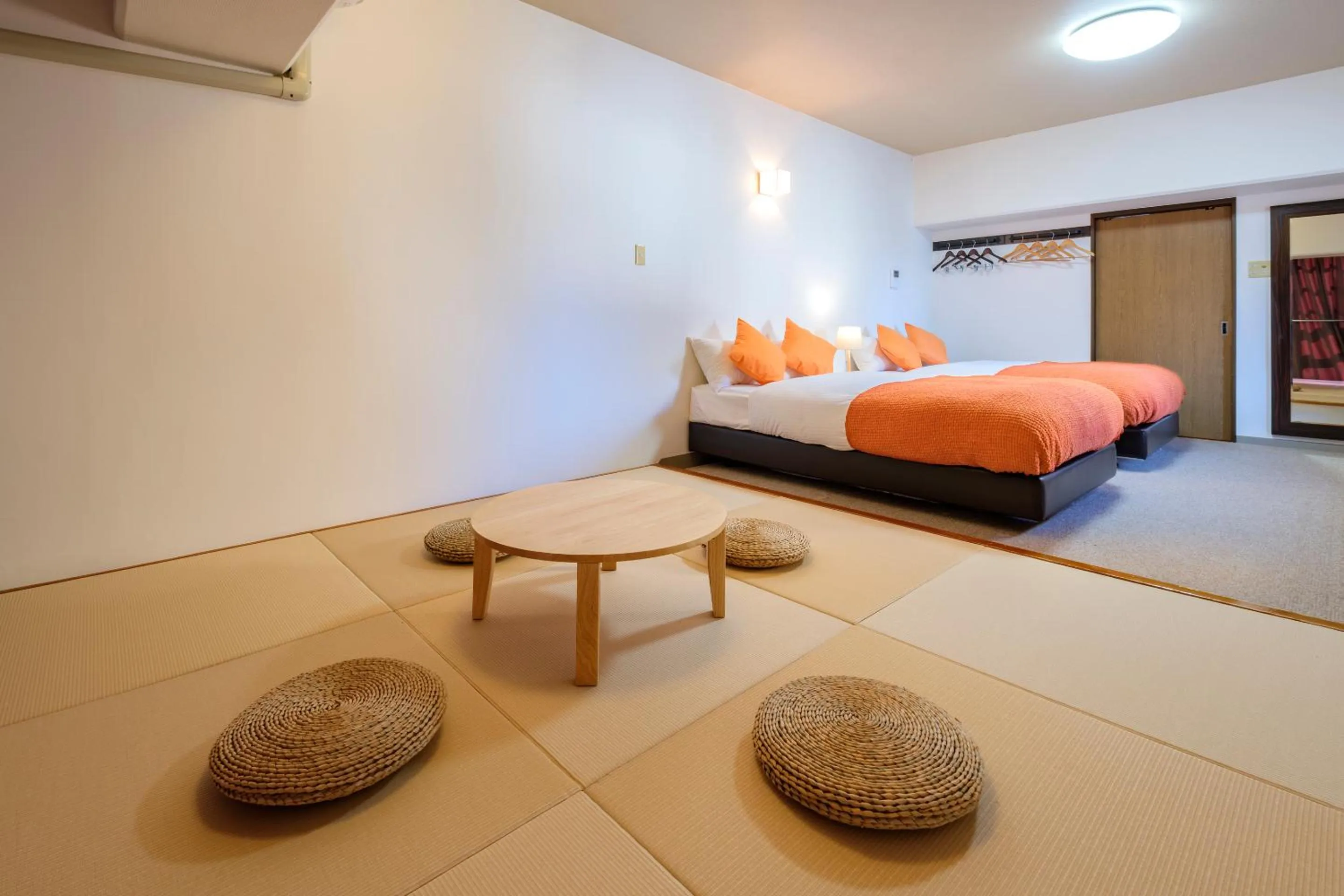 Dining area, Bed in Miyazaki Mango Hotel