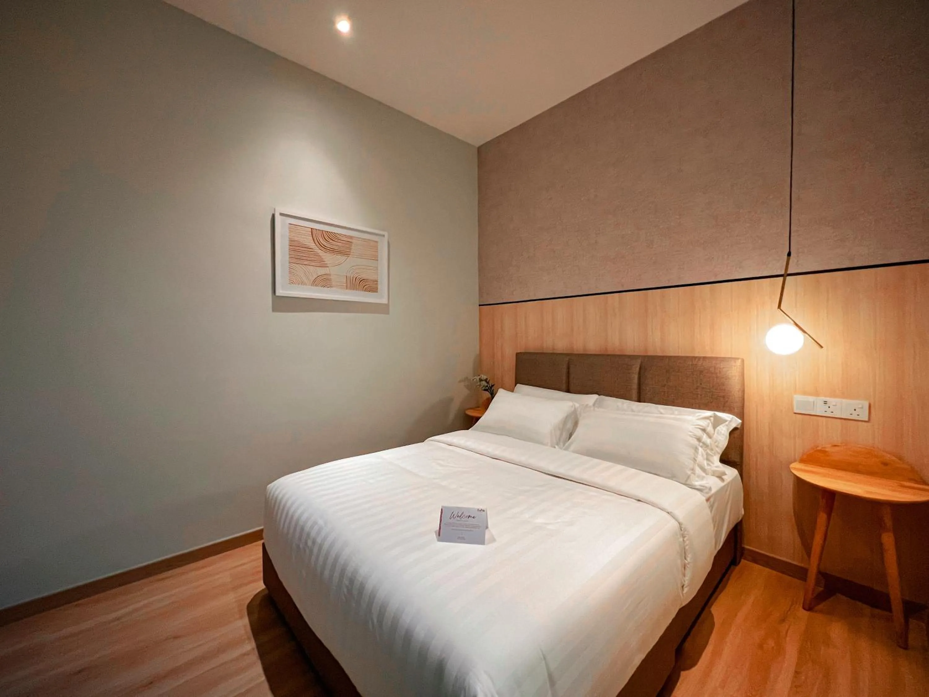 Bed in La Vie Hotel Juru