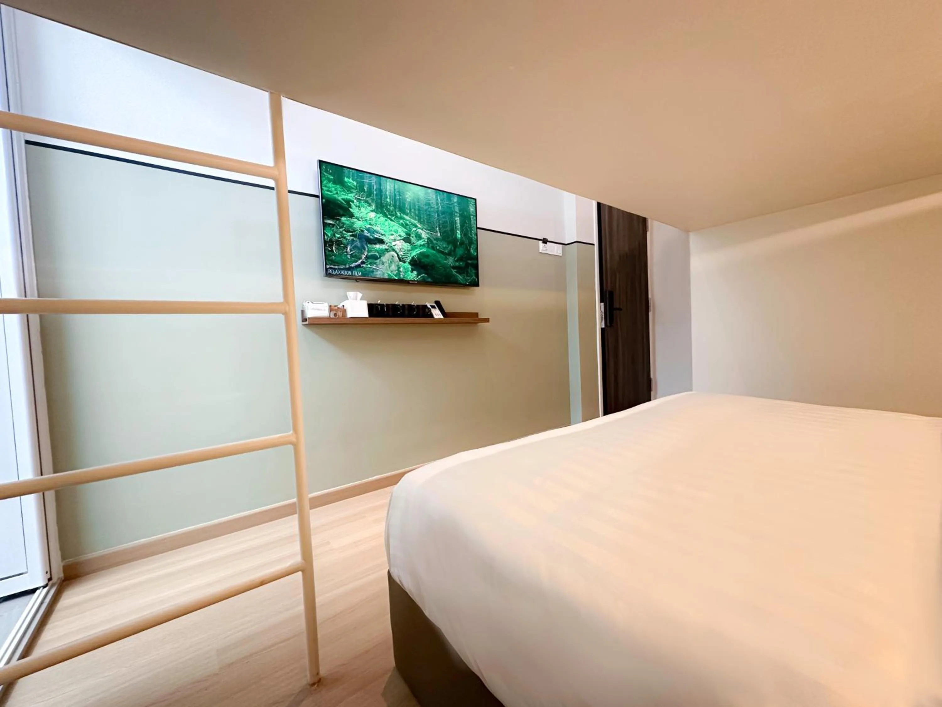 Bed in La Vie Hotel Juru