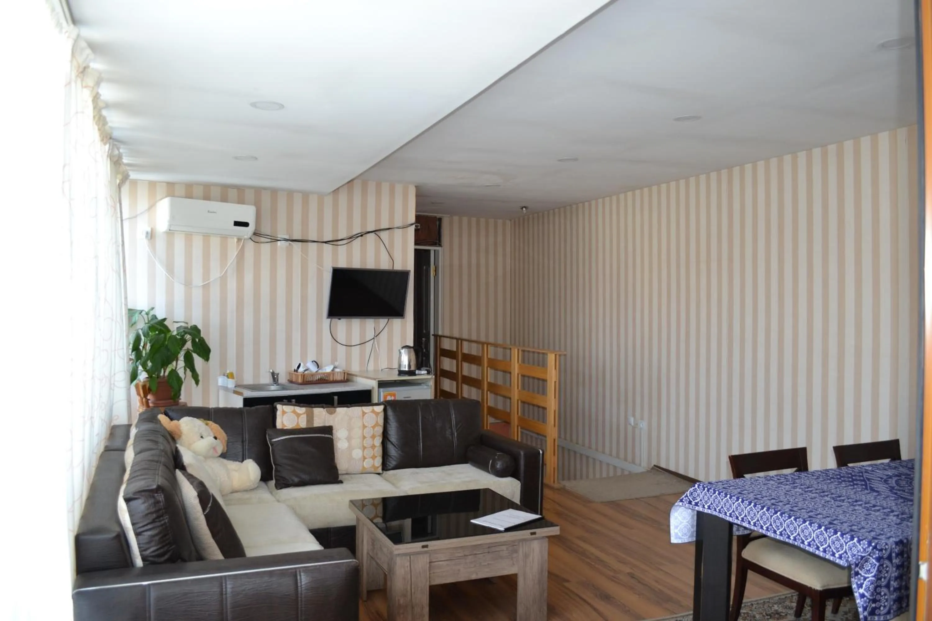 Communal lounge/ TV room in Your House In Tbilisi