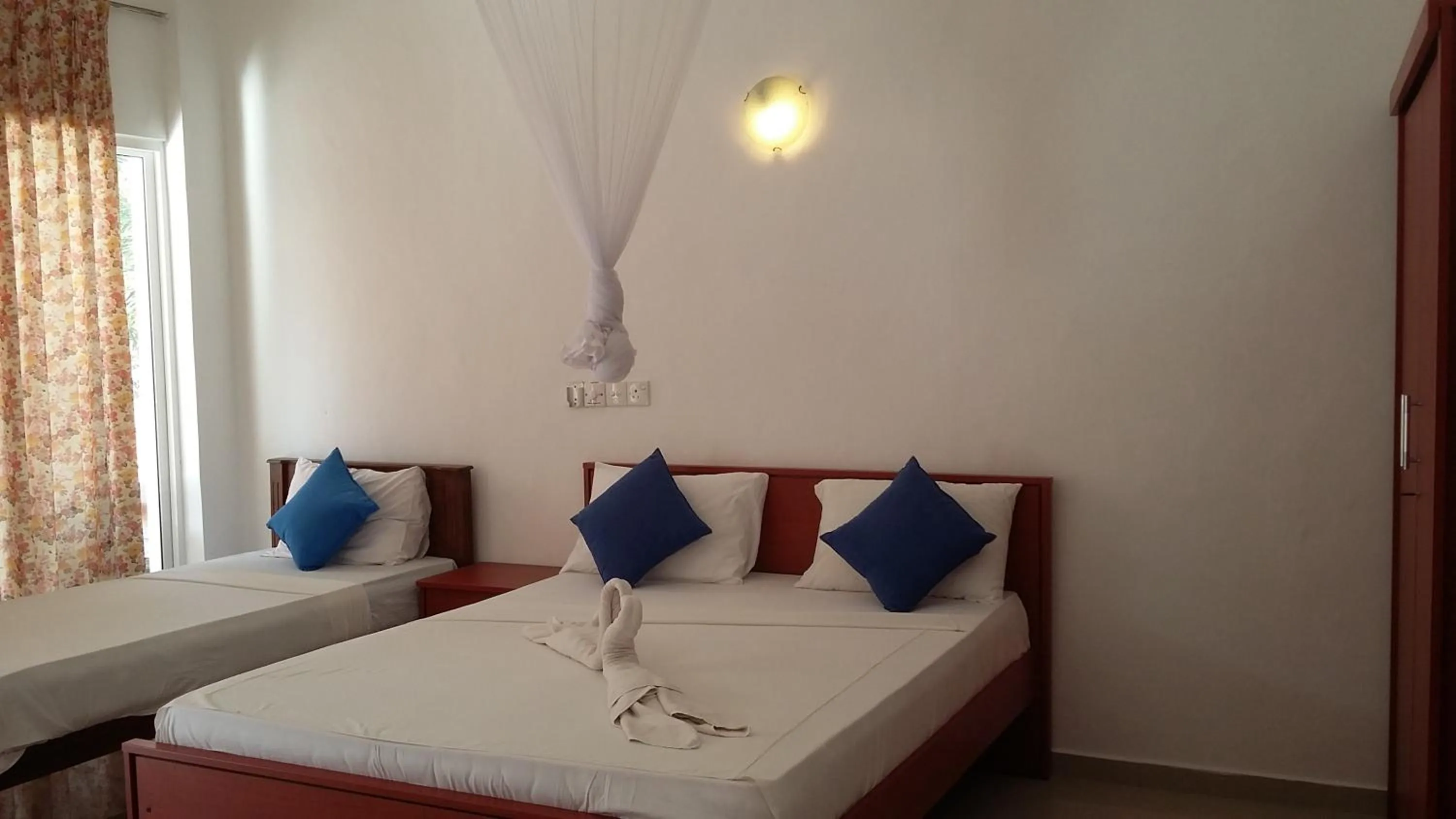 Bedroom in Oasis Beach Resort
