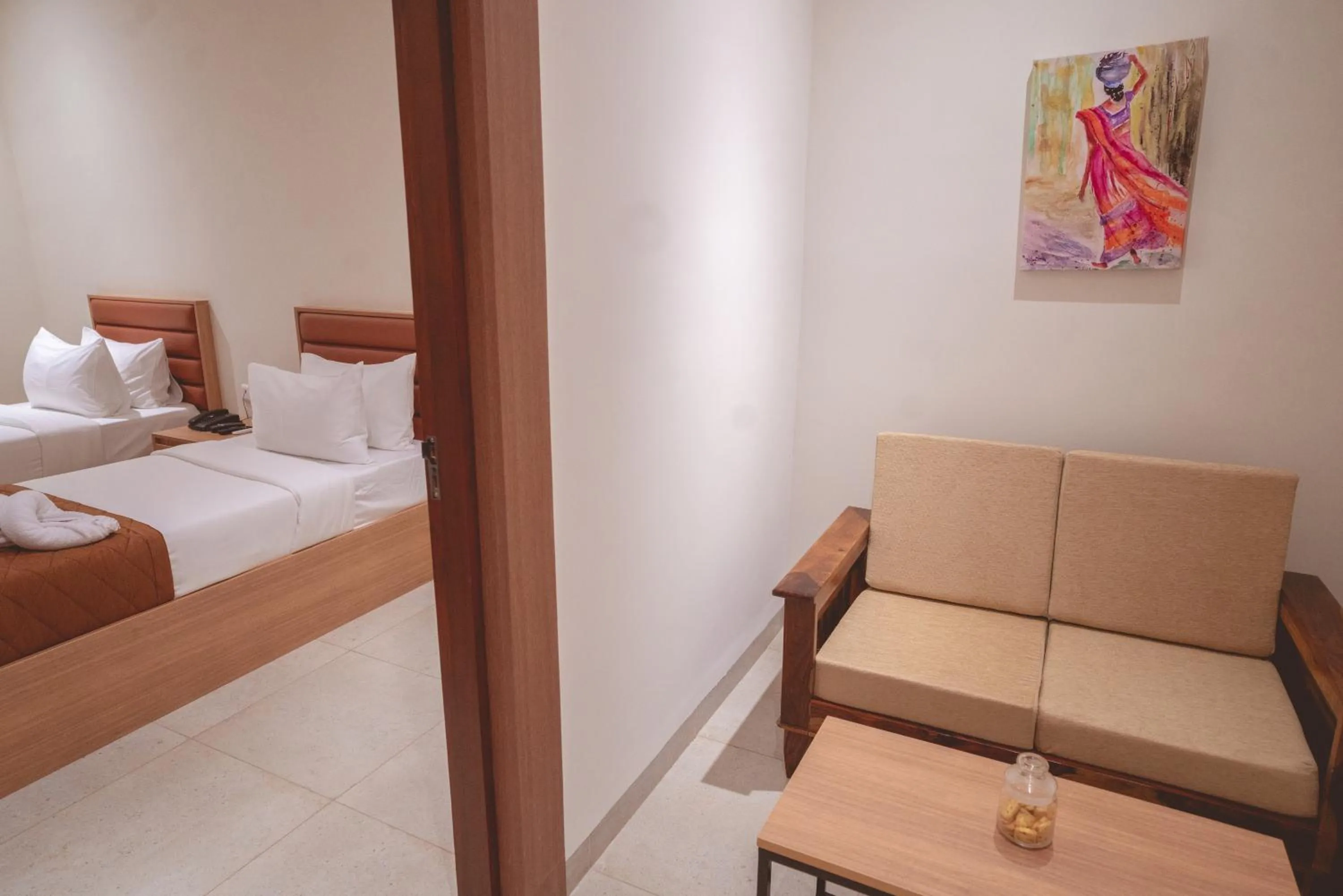 Living room, Bed in HOTEL ACHYUT