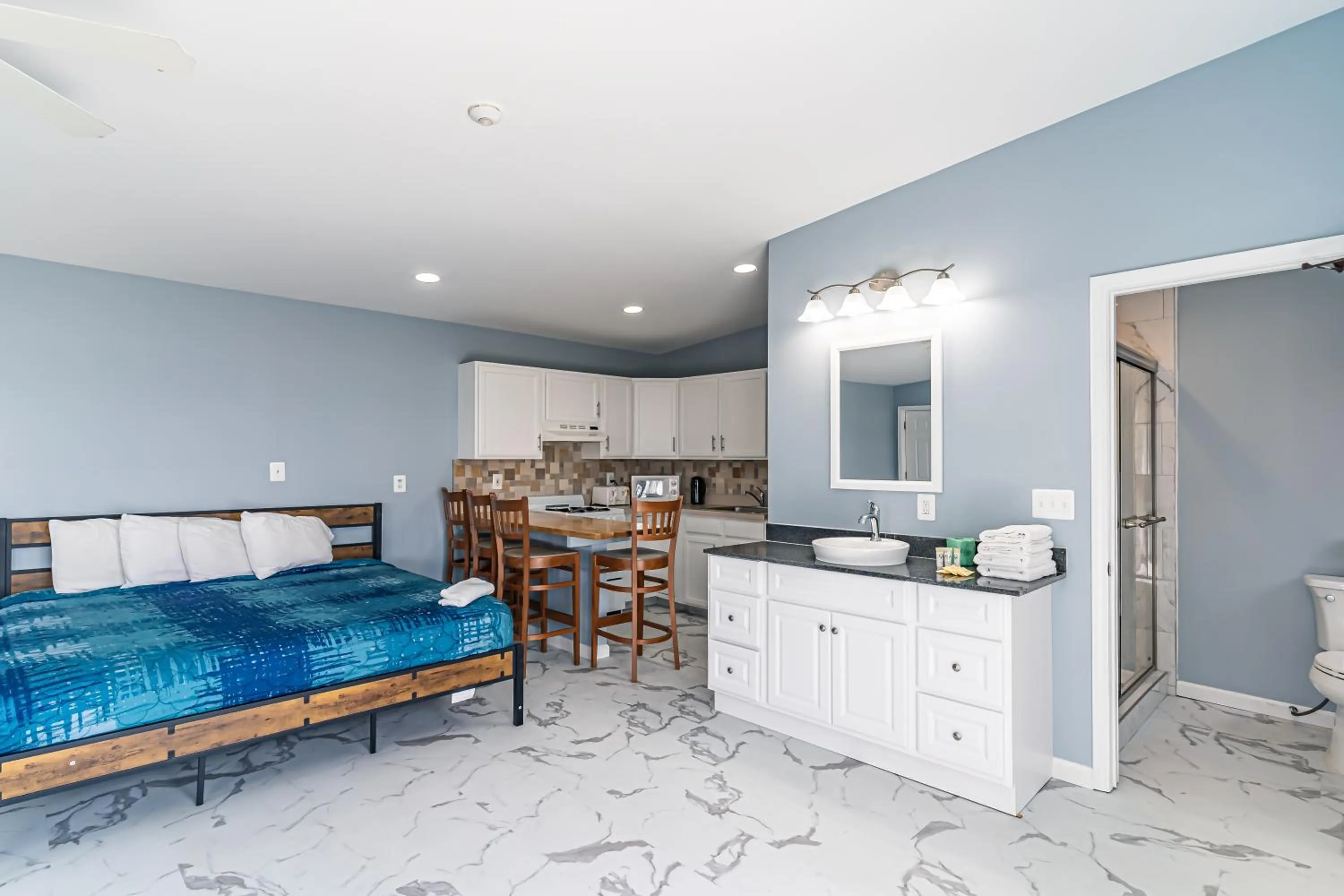 Bed in Boardwalk Sand & Surf Beach Hotel Oceanfront