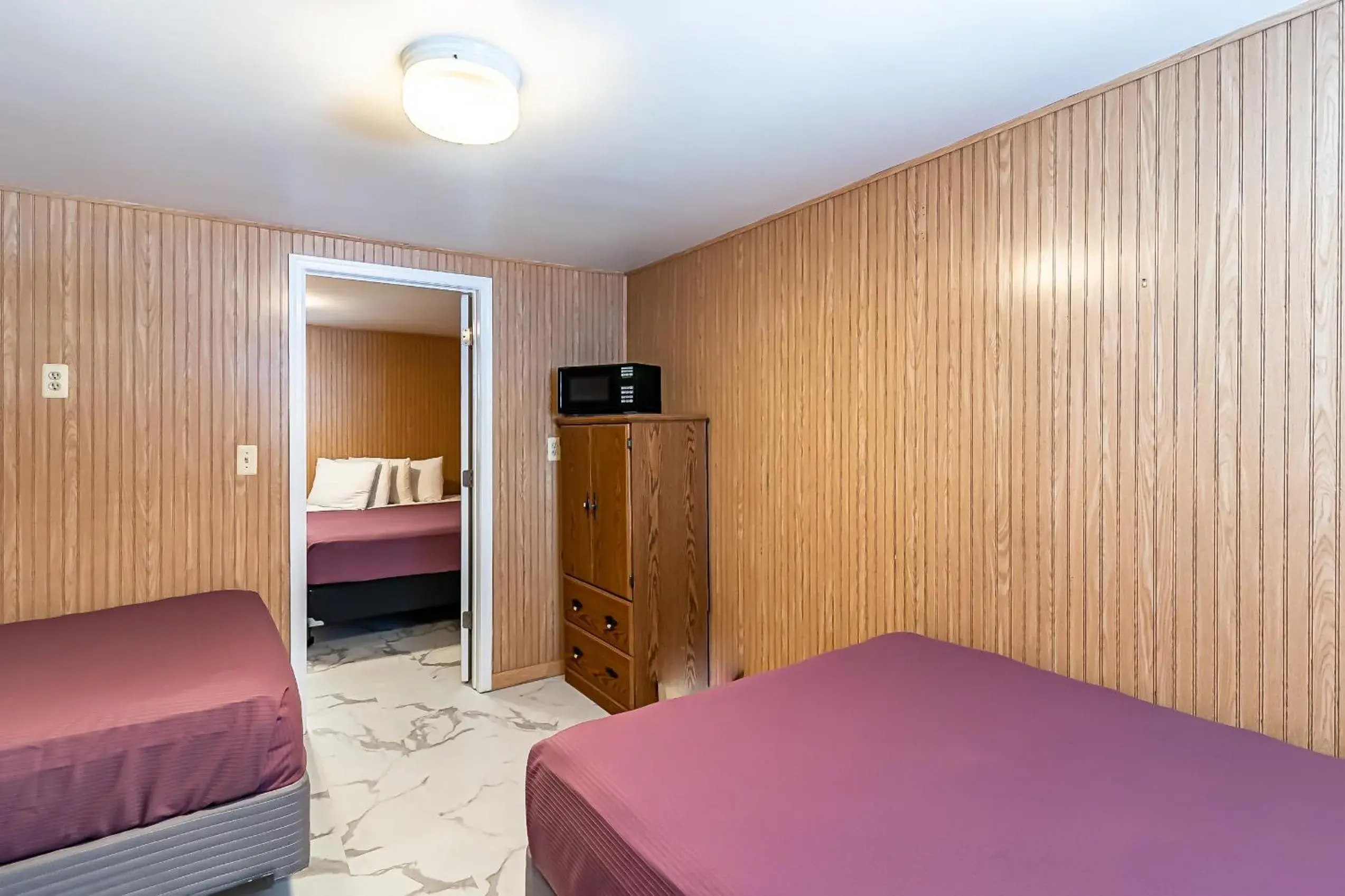 Triple Room with Private Bathroom in Boardwalk Sand & Surf Beach Hotel Oceanfront Triple Room with Private Bathroom in Boardwalk Sand & Surf Beach Hotel Oceanfront