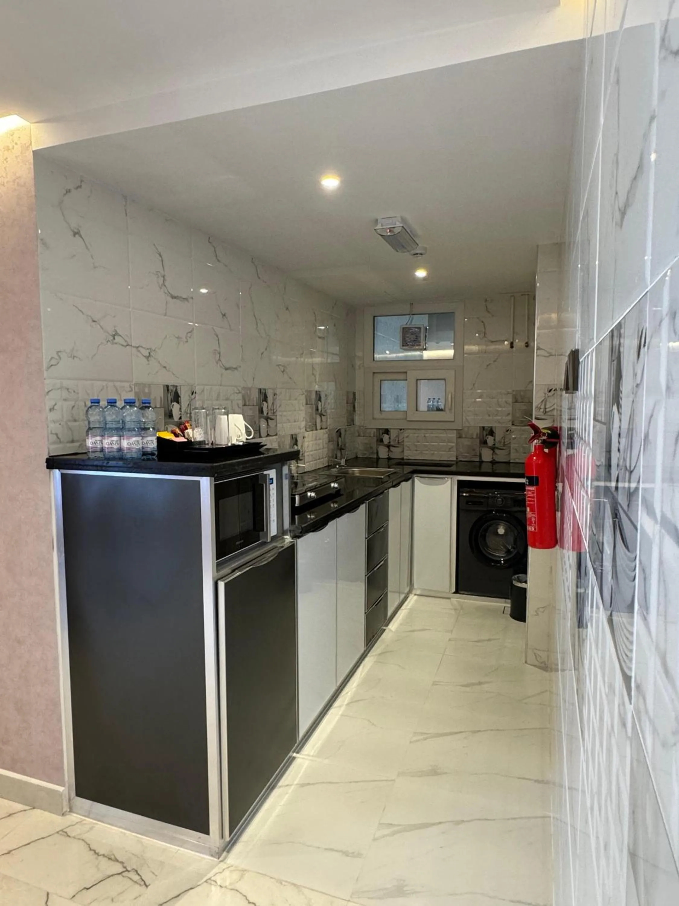 Kitchen or kitchenette in Royal Plaza Hotel