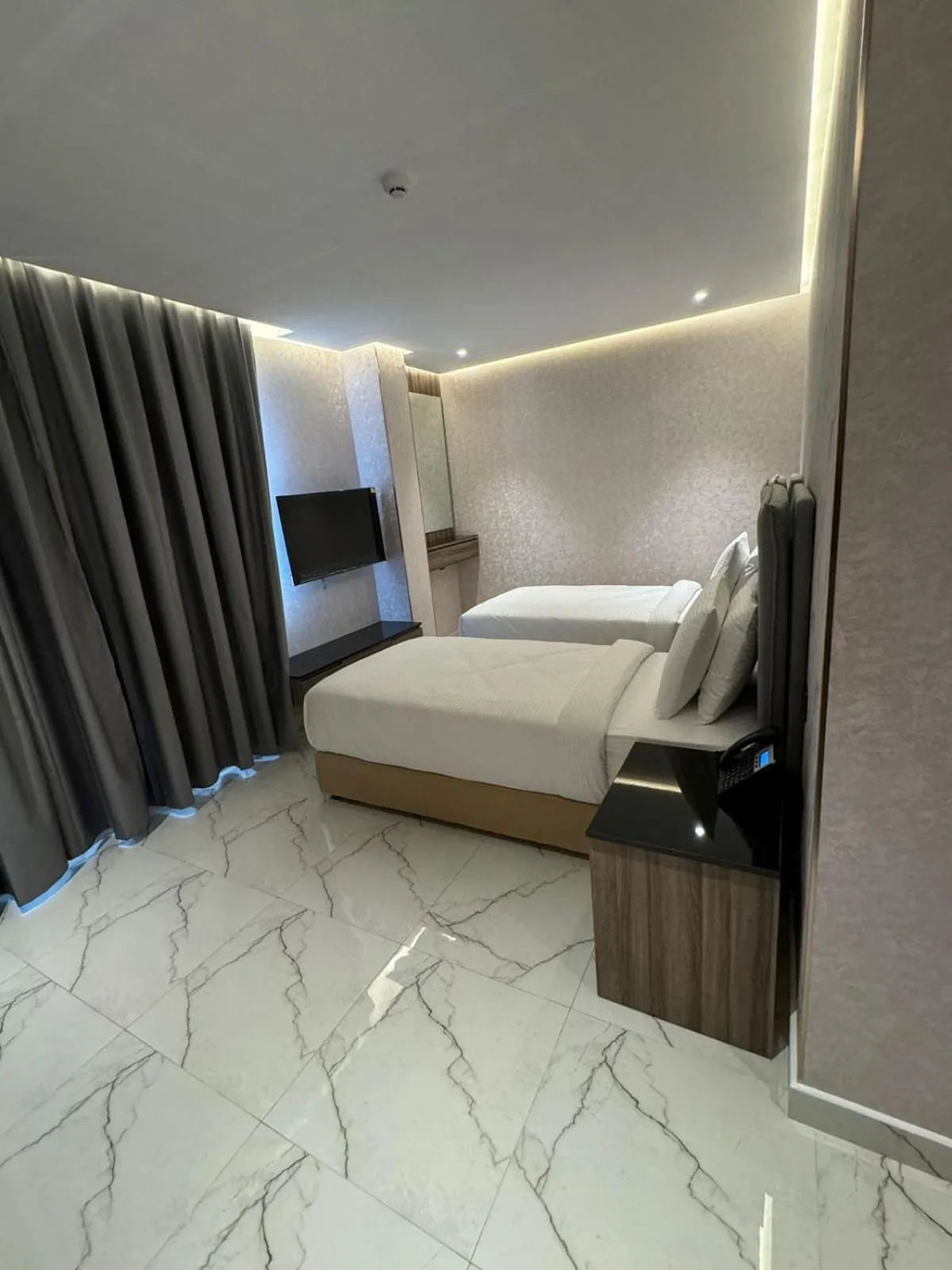 Bed in Royal Plaza Hotel