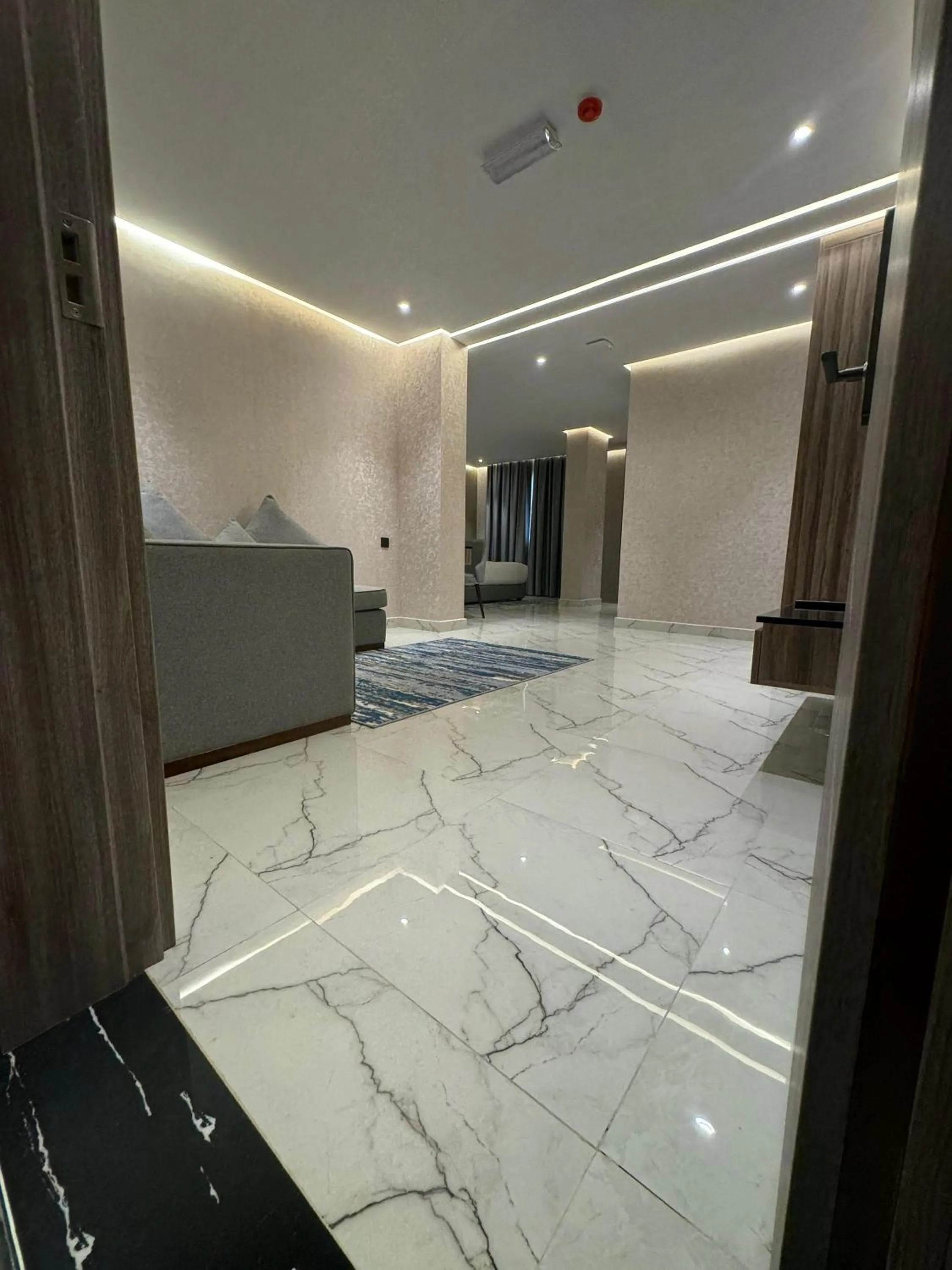 Communal lounge/ TV room in Royal Plaza Hotel