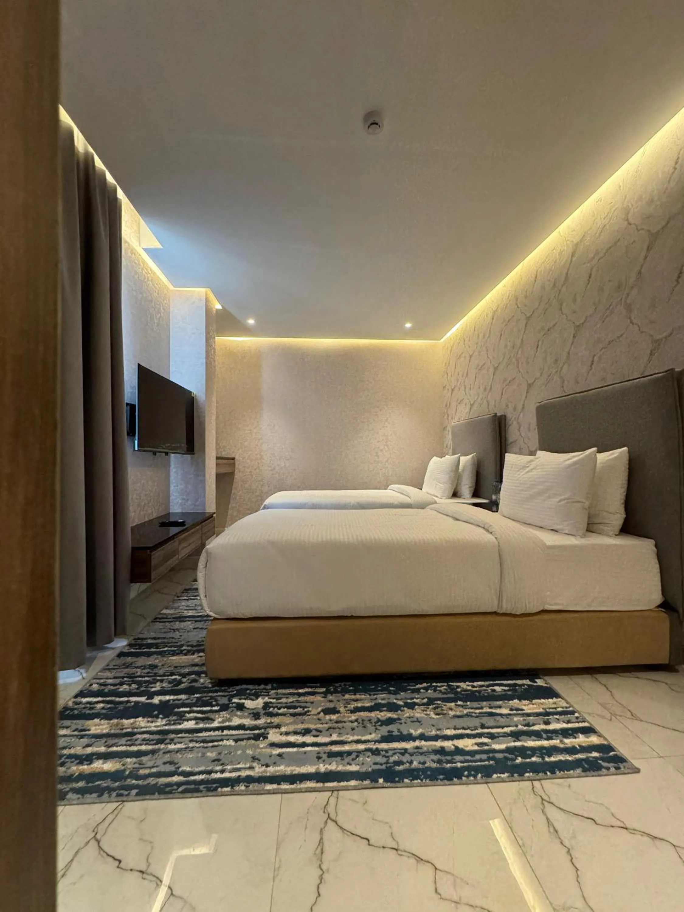 Bed in Royal Plaza Hotel