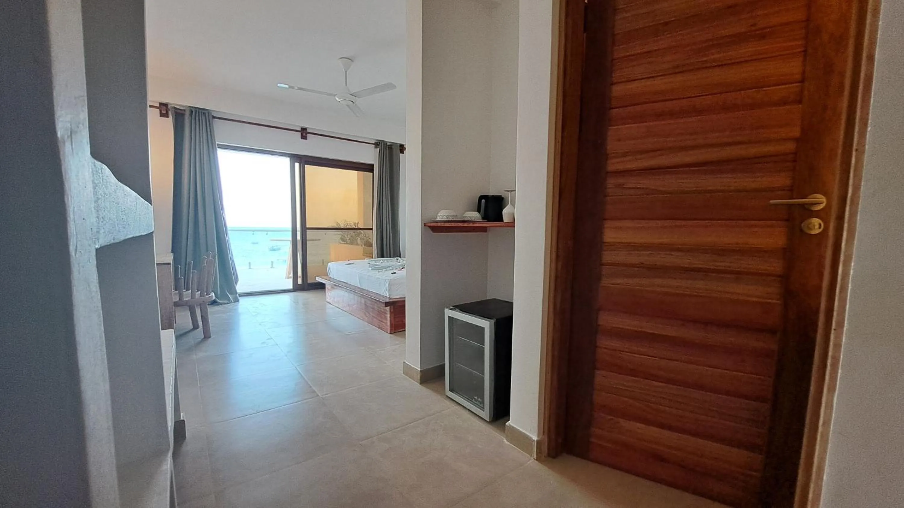 Bedroom in Aluna Beach Apartments