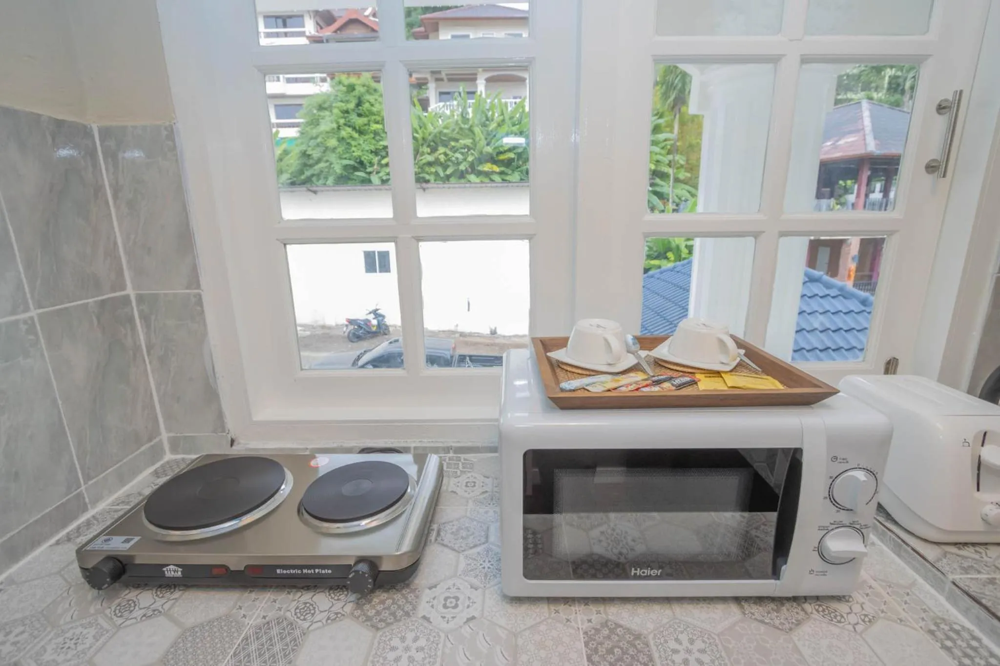Kitchen or kitchenette in RoomQuest The Peak Patong Hill