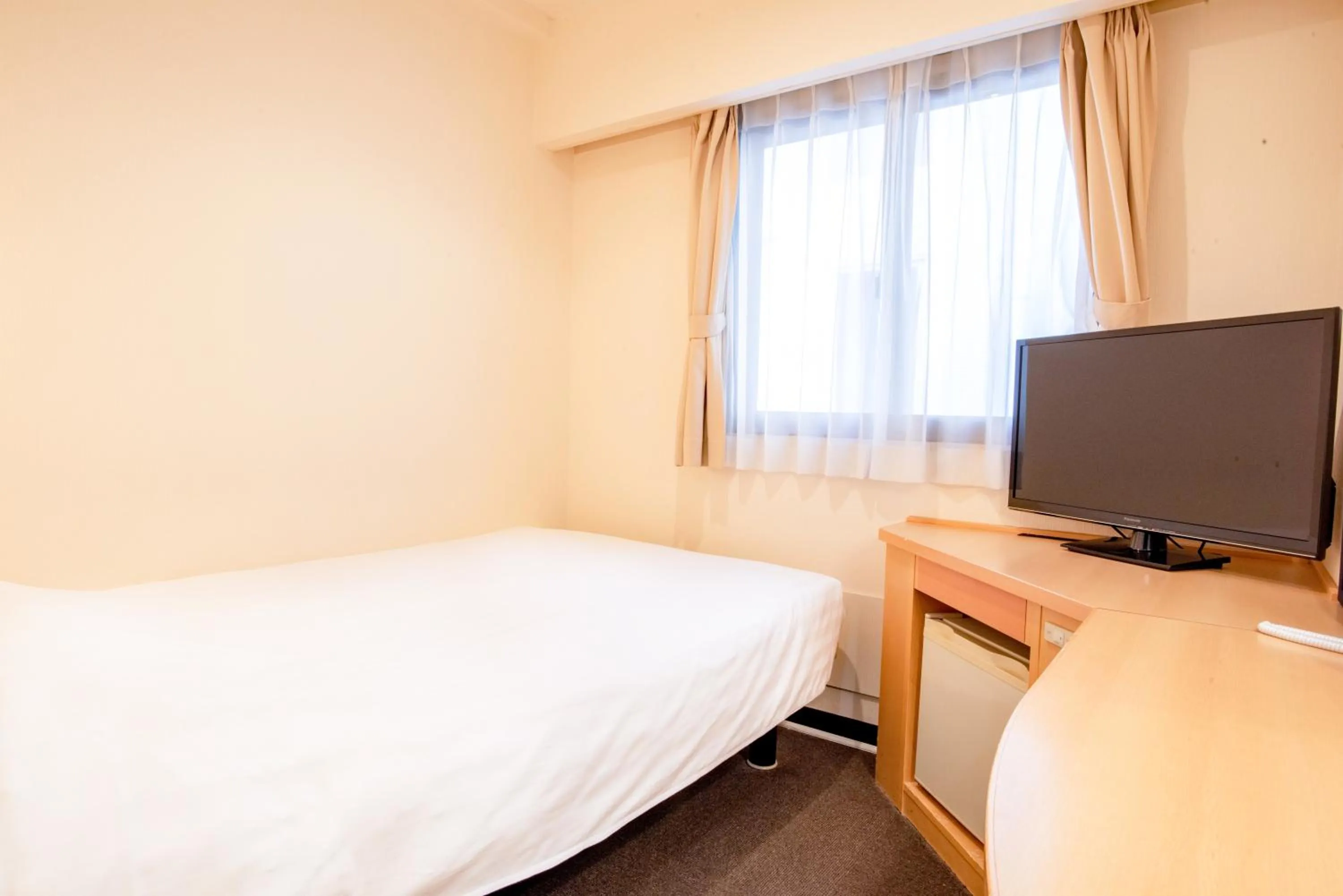 Bed in le Lac Hotel Yokkaichi