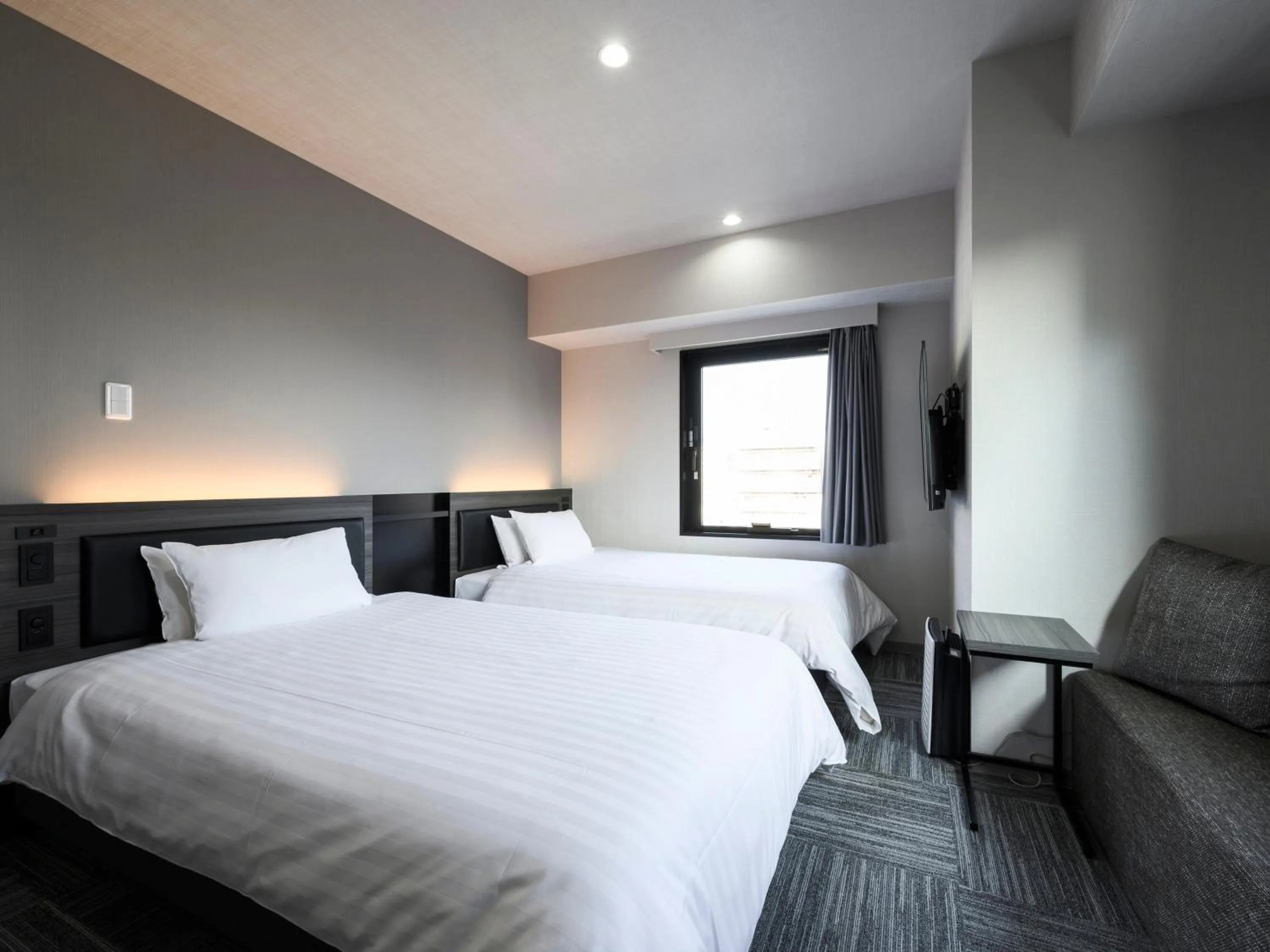 Photo of the whole room, Bed in HOTEL NOIR Kagoshima Chuo Station