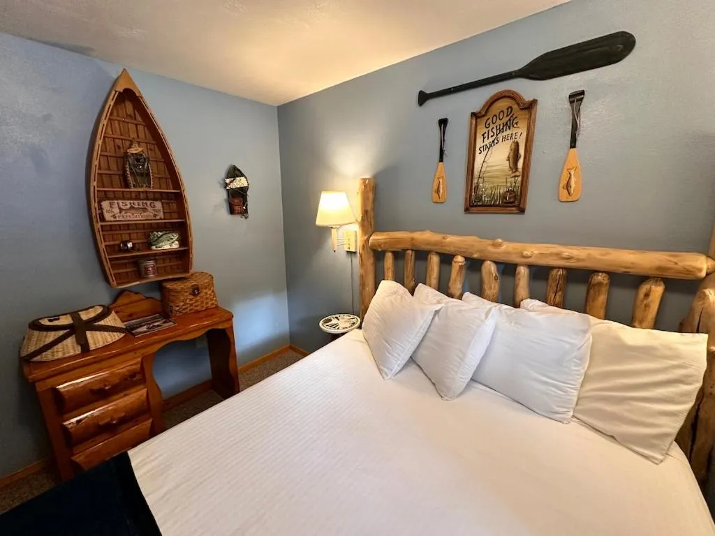 Bed in Ute Bluff Lodge, Cabins and RV park