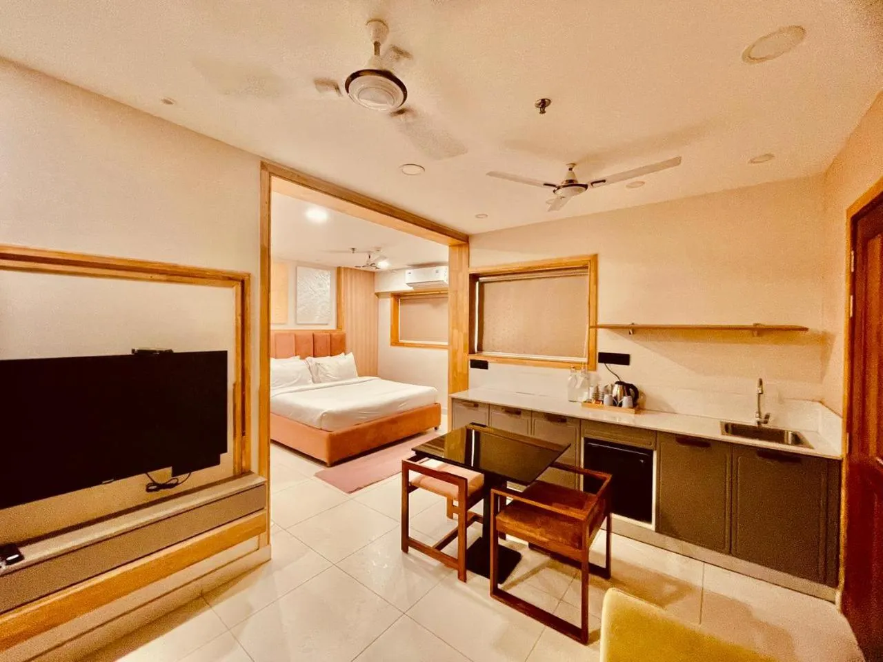 Communal lounge/ TV room, Bed in The Habitat Suites-Walkable distance to Guruvayoor temple