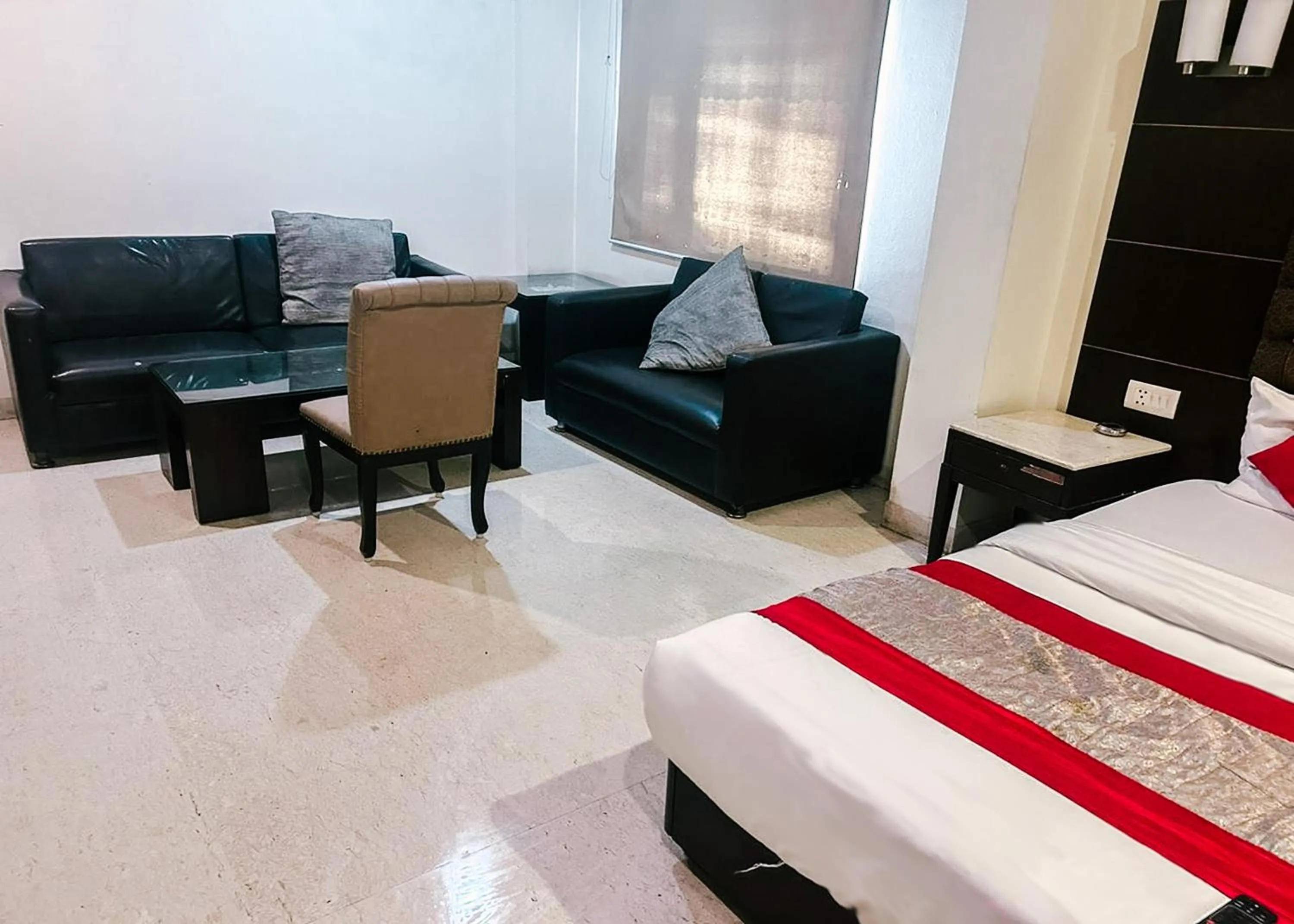 Seating area, Bed in The Metropolis Guest House Near RK Ashram Metro Station