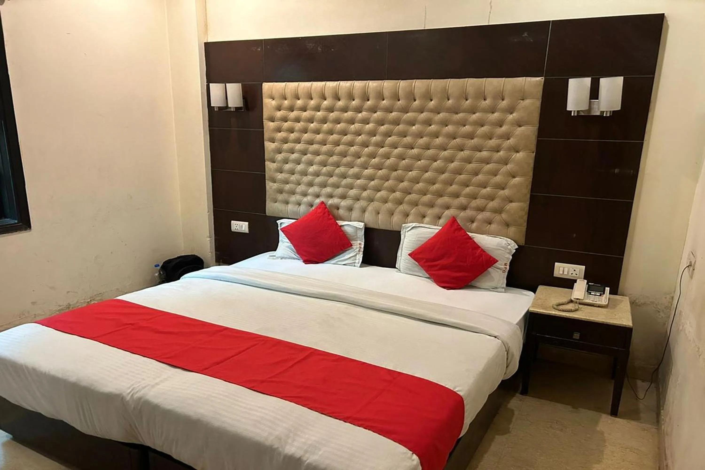 Photo of the whole room, Bed in The Metropolis Guest House Near RK Ashram Metro Station