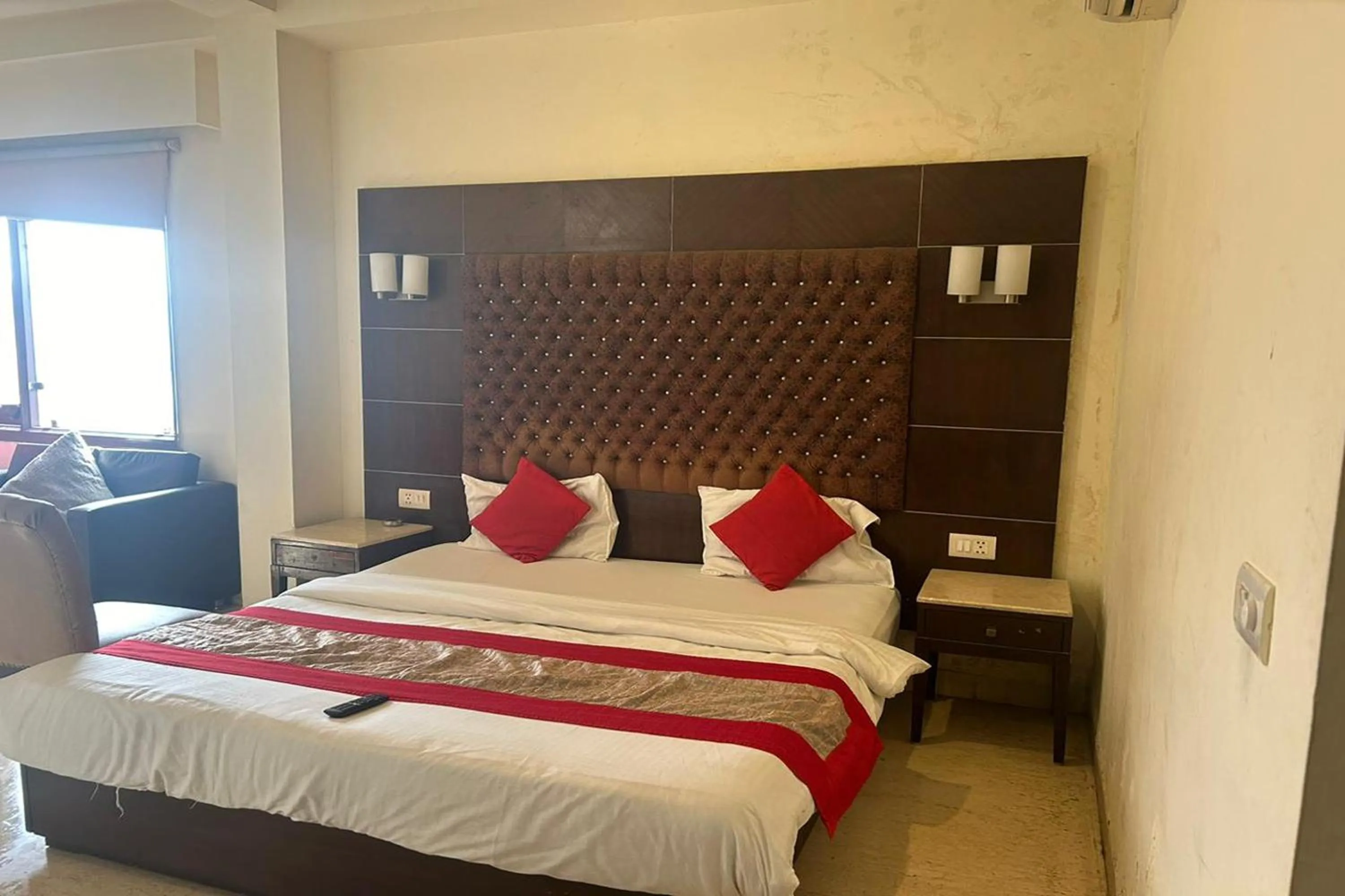 Photo of the whole room, Bed in The Metropolis Guest House Near RK Ashram Metro Station
