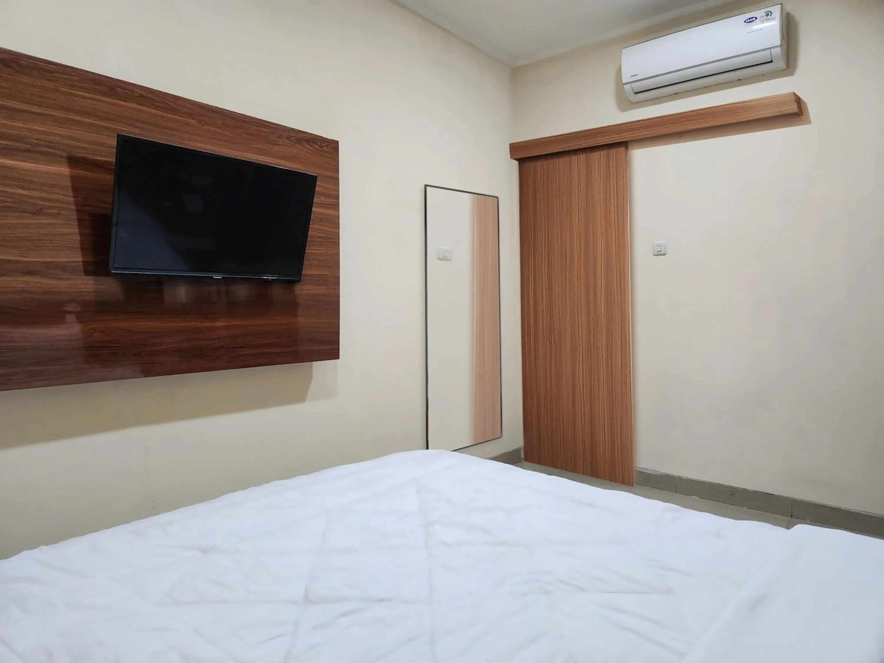 Bed in Joker Hotel & Residence
