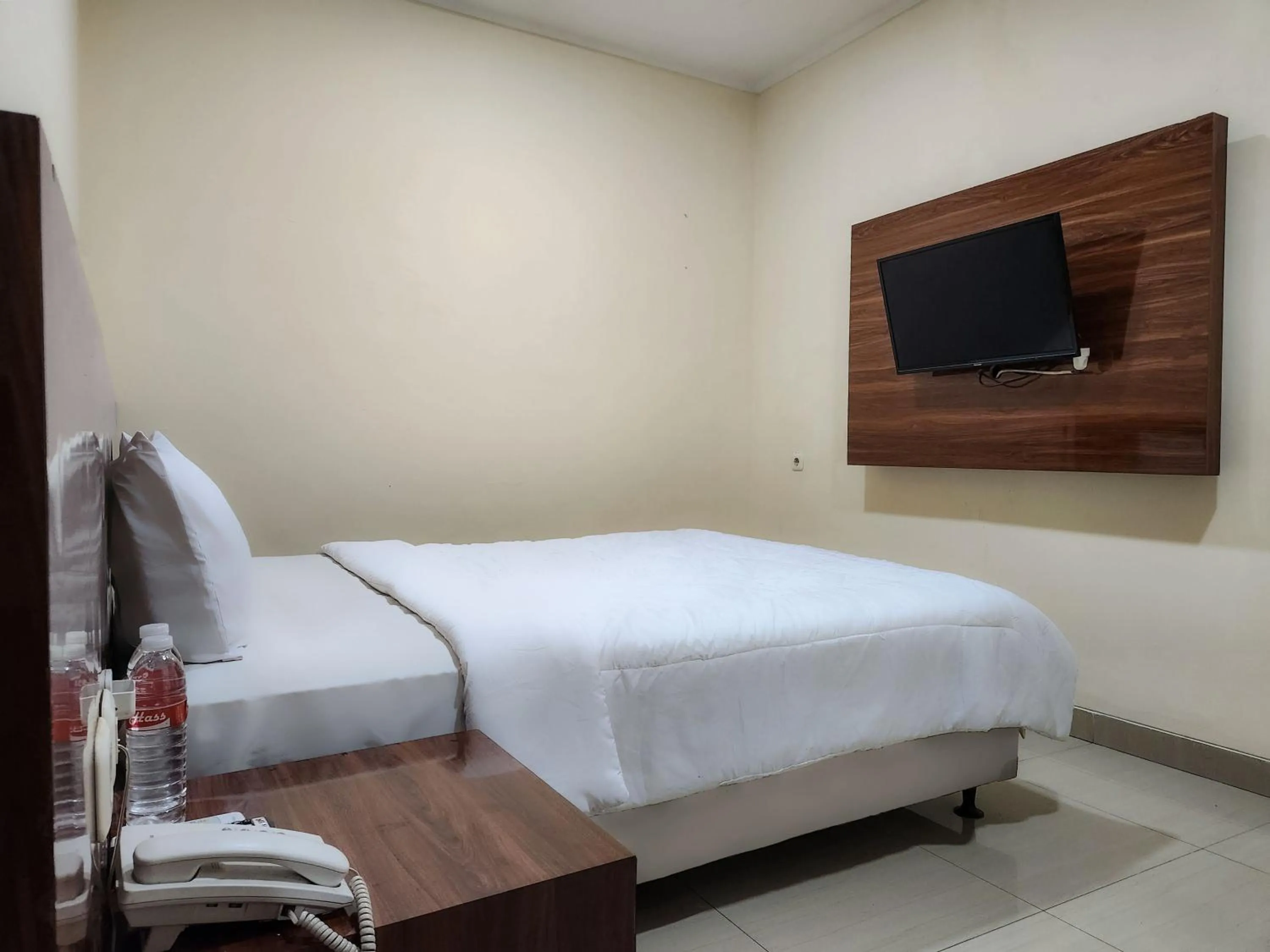 Bed in Joker Hotel & Residence