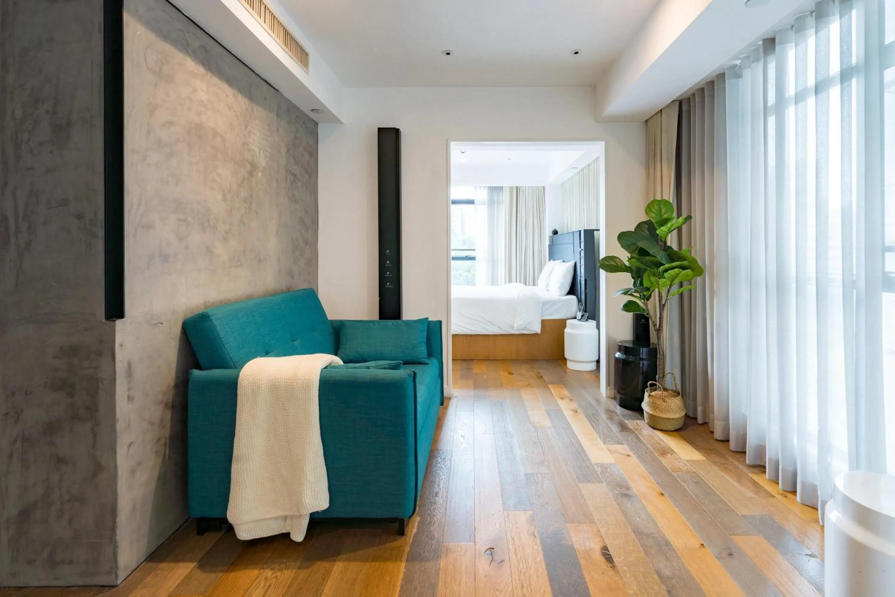 Bed, Seating Area in Residence G Hong Kong - by Hotel G