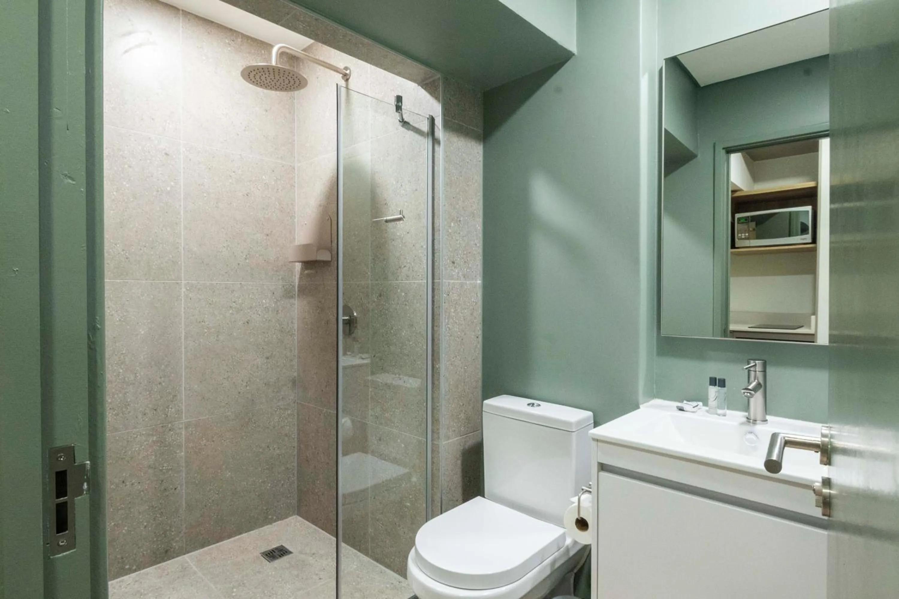 Bathroom in Habitat Aparthotel by Totalstay