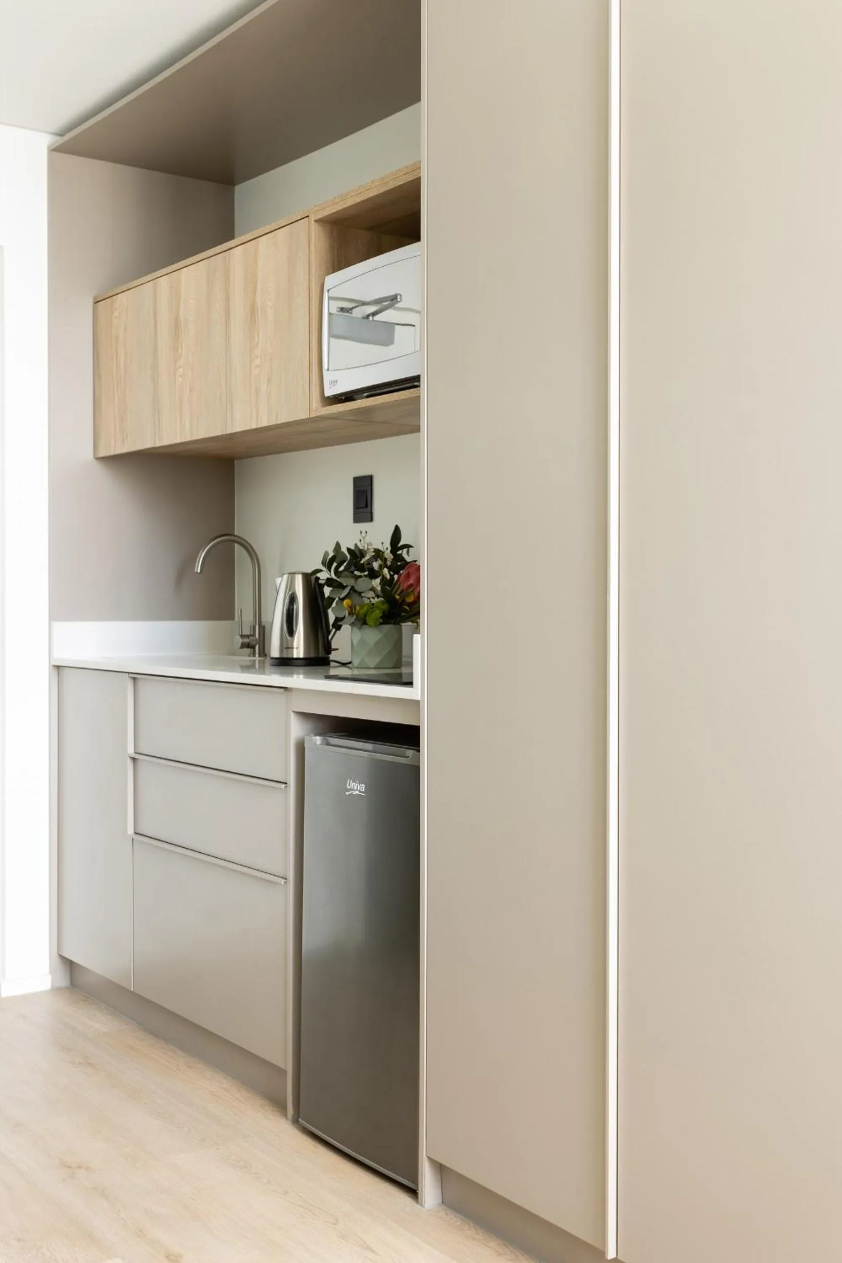 Kitchen or kitchenette in Habitat Aparthotel by Totalstay