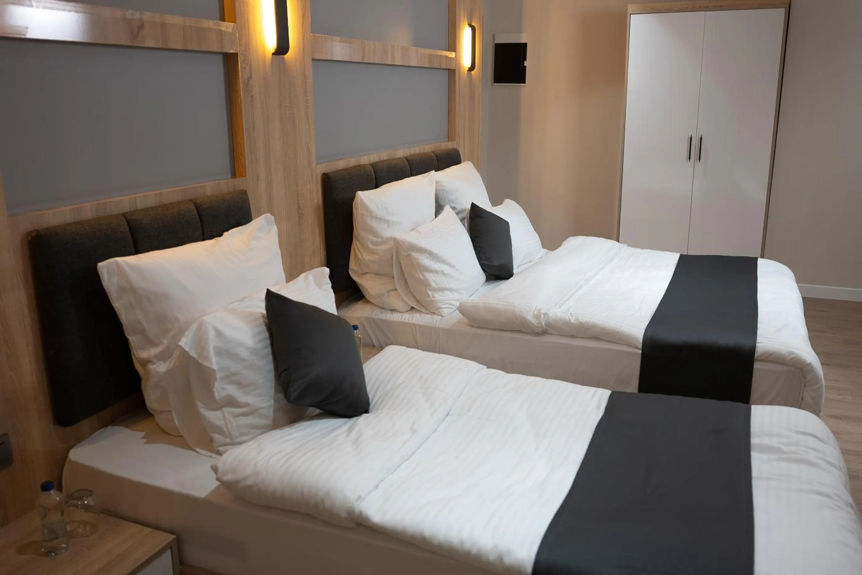 Bed in Golden River Hotel By Continent