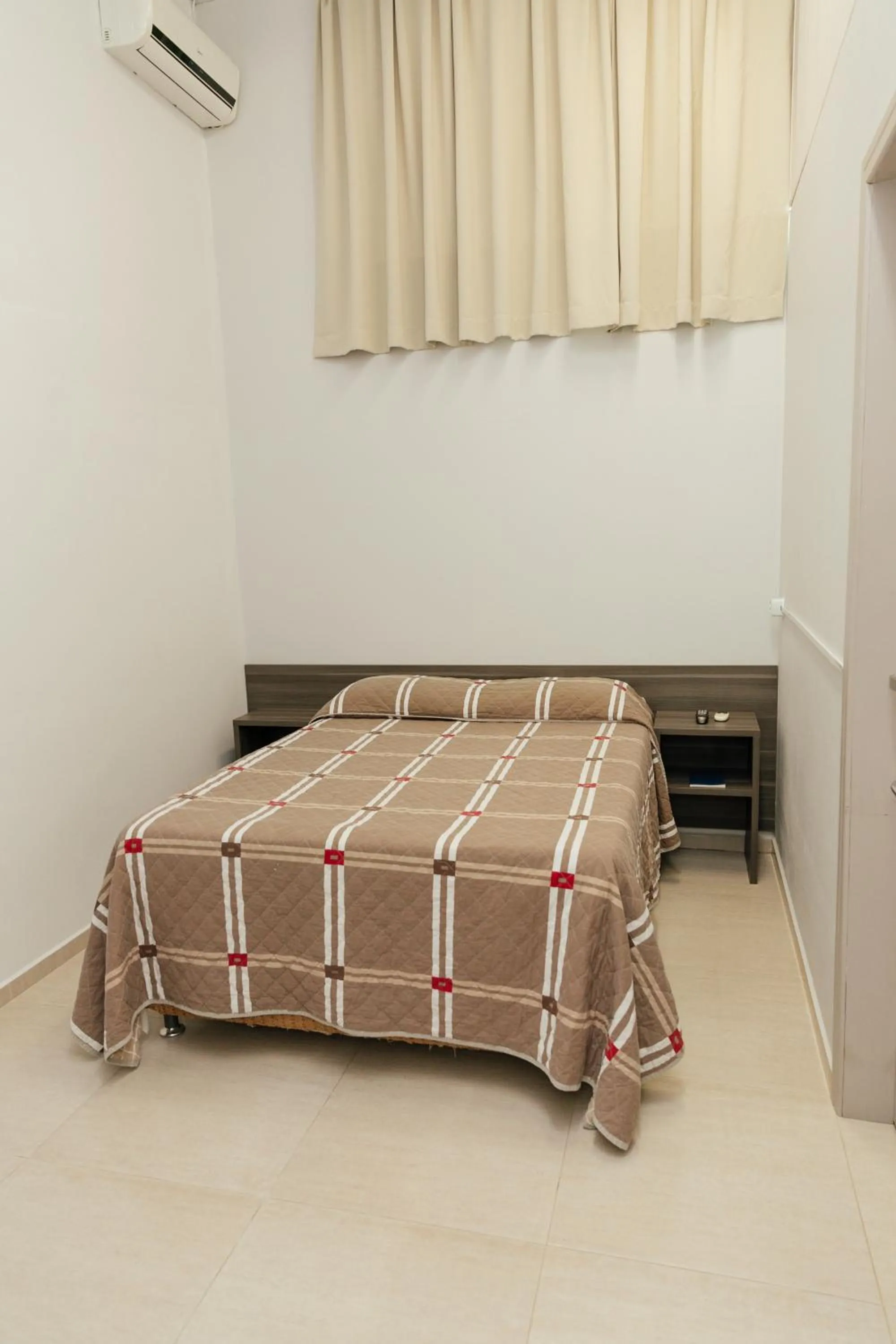 Bed in Hotel Bergozza