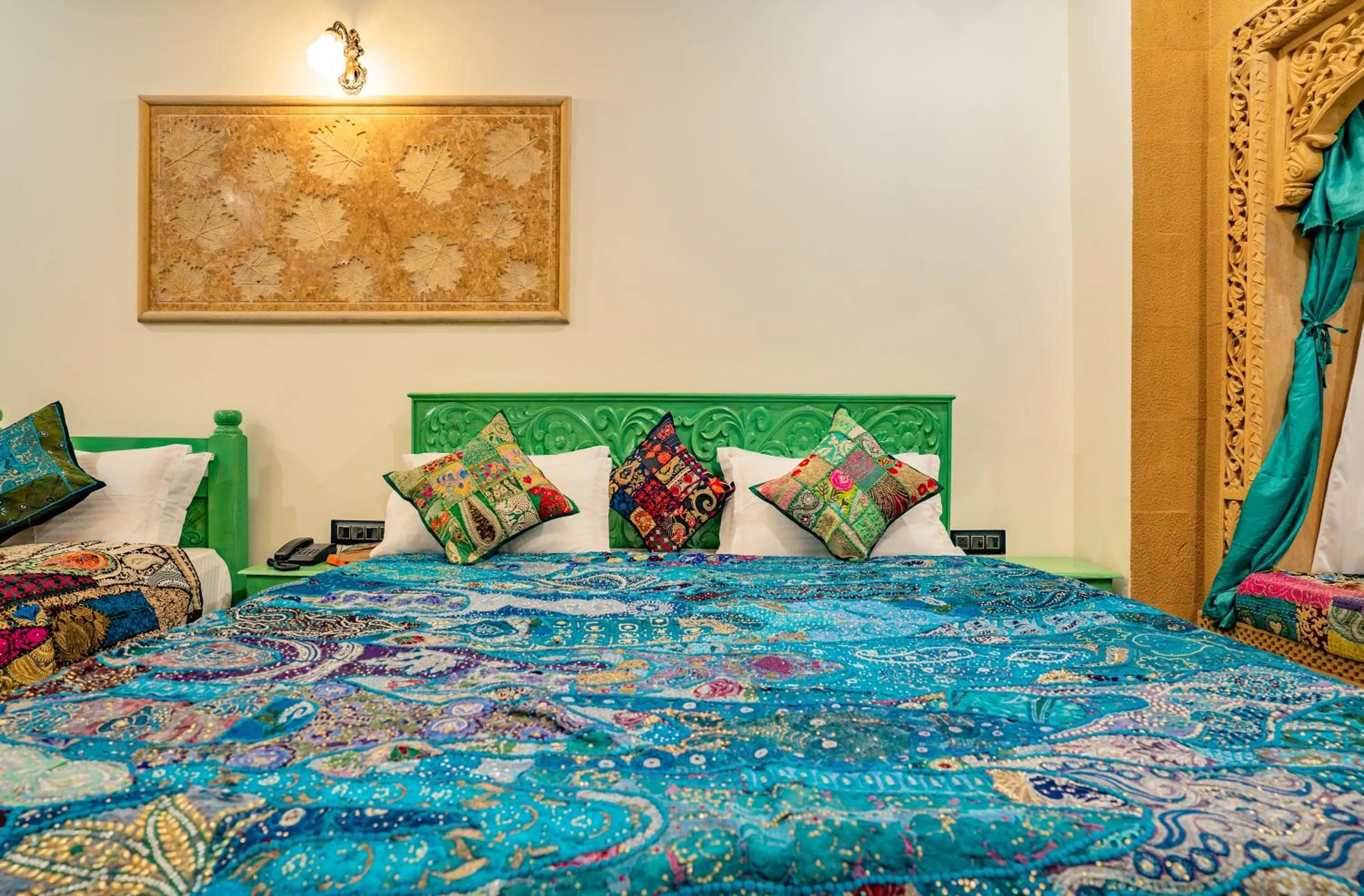 Bed in Tripli Hotels Prithvi Haveli