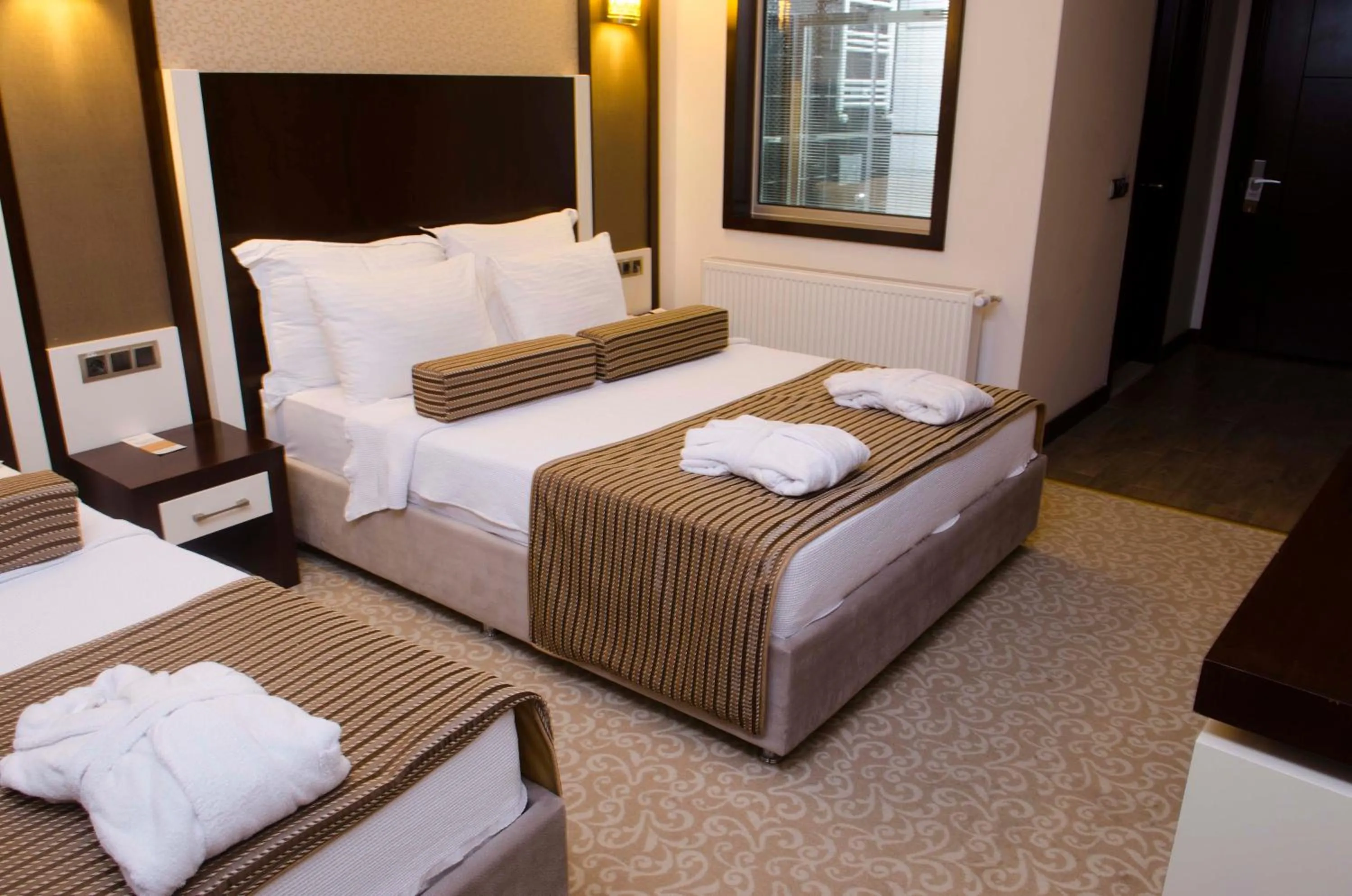 Bed in Lavin Hotel & Spa